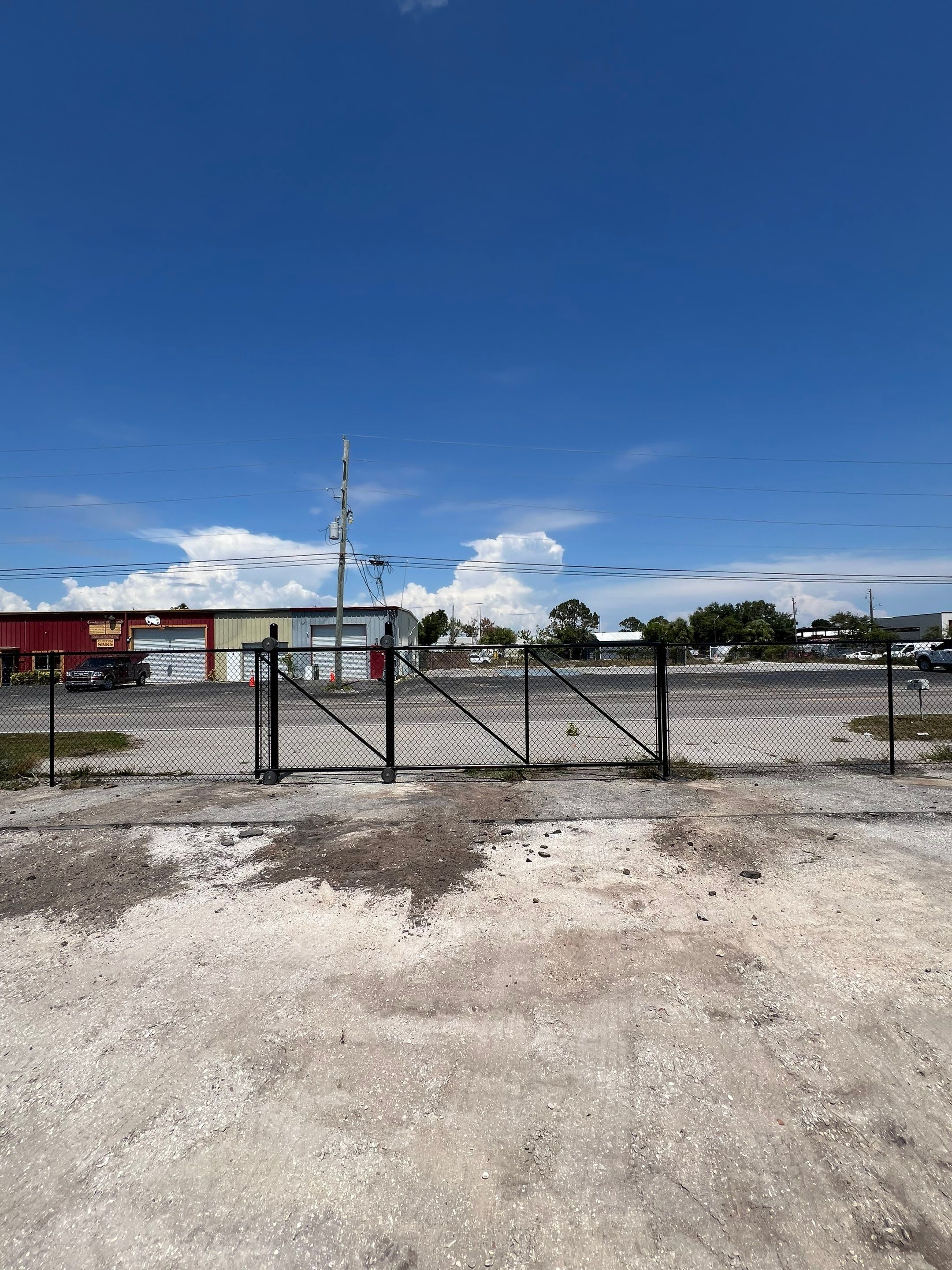 Chain-link Fence Installation using 6ft Black Chain Link Fence  by Asap fence and gates, LLC