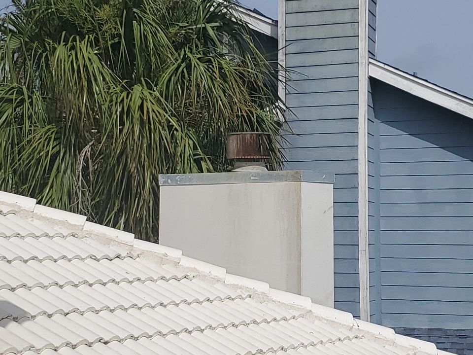 Chimney Cap & Chase Replacement using Custom Fabricated Steel by Lighthouse Roofing