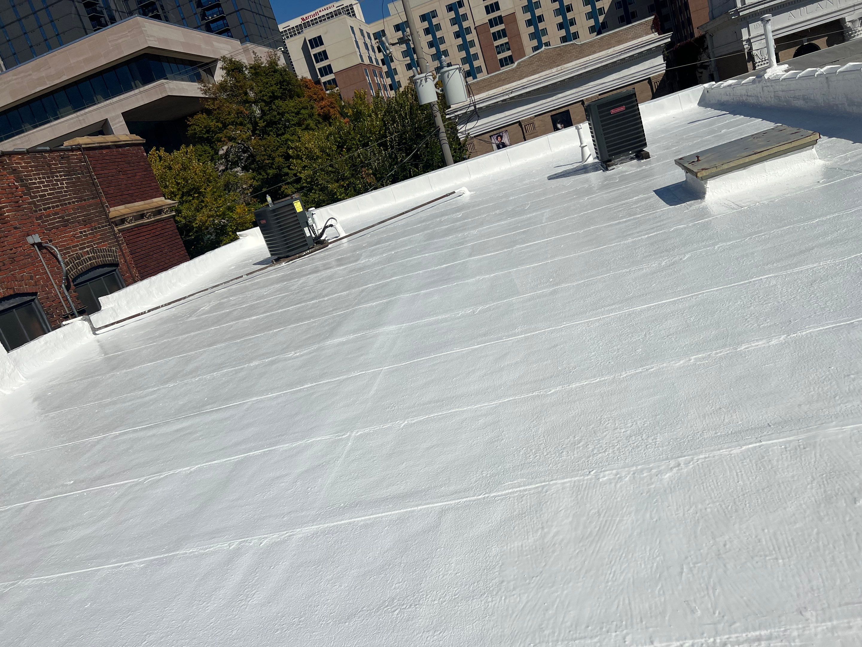 Commercial Roofing Coating using Everest Silicone Coating by Georgia Roof Advisors