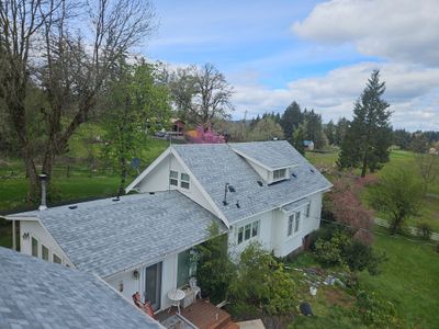 Residential Roofing Installation using IKO Dynasty (Color: Frostone Grey)