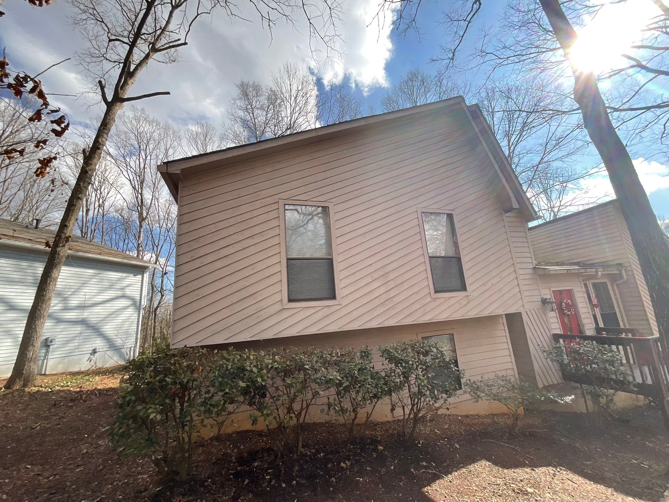 Exterior Painting and Deck Refinishing for an Acworth Residence by Swift Home Renovations