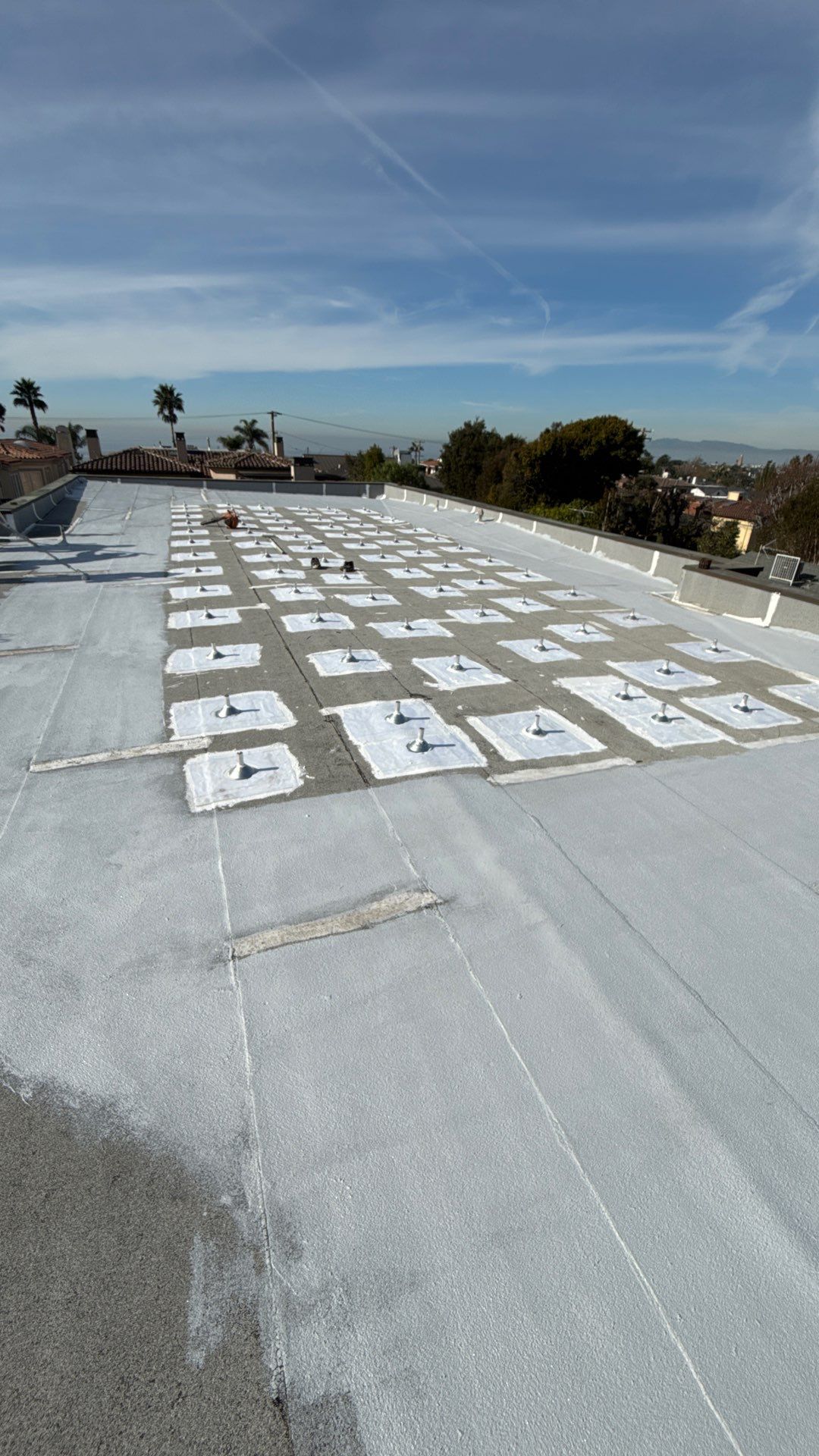 Residential Roofing Installation using ASC Silicone Membrane by Hull Brothers Roofing