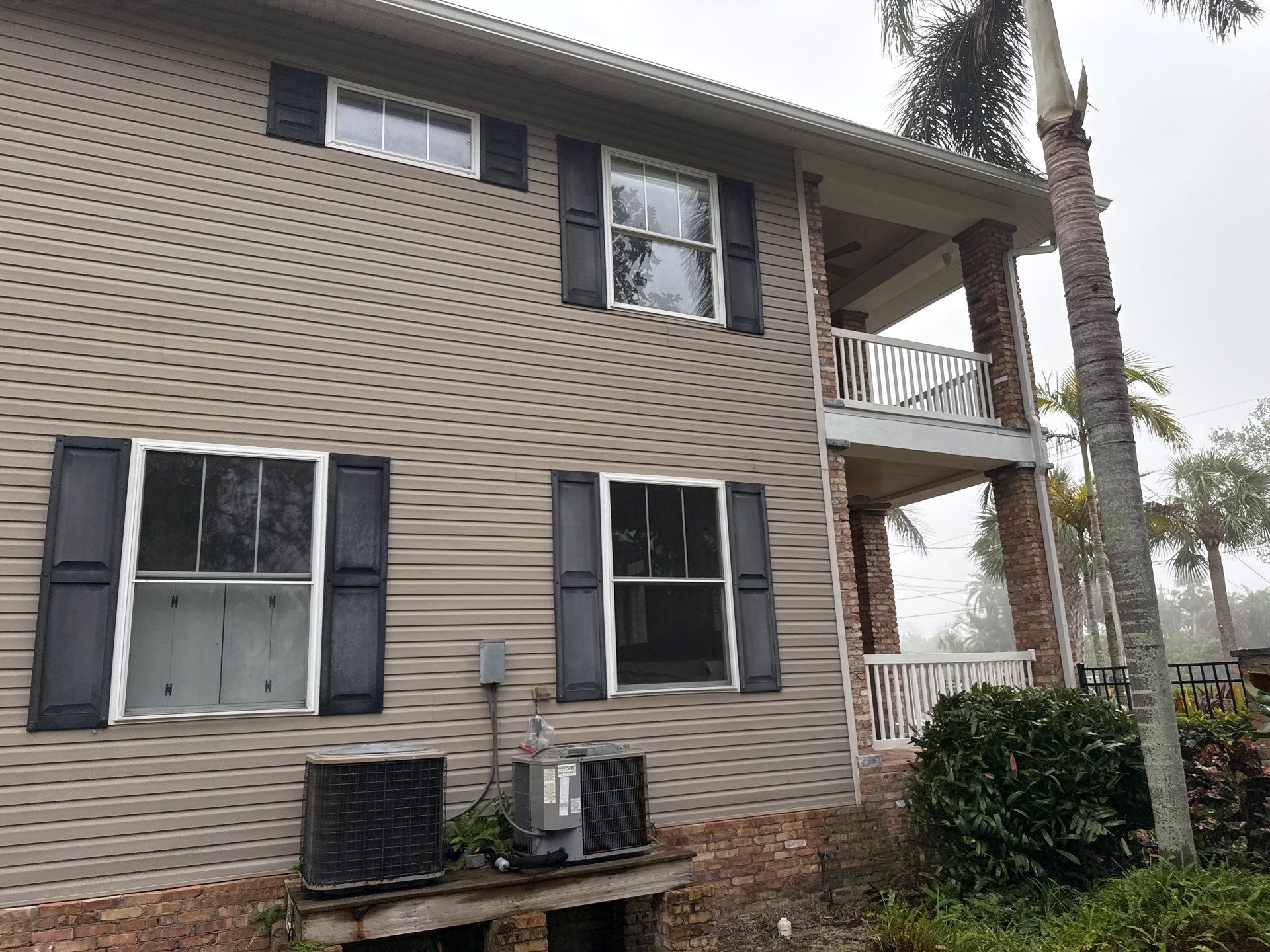 2-Story House Wash and Garage Pressure Washing in Palmetto, FL by Sunshine AquaWash