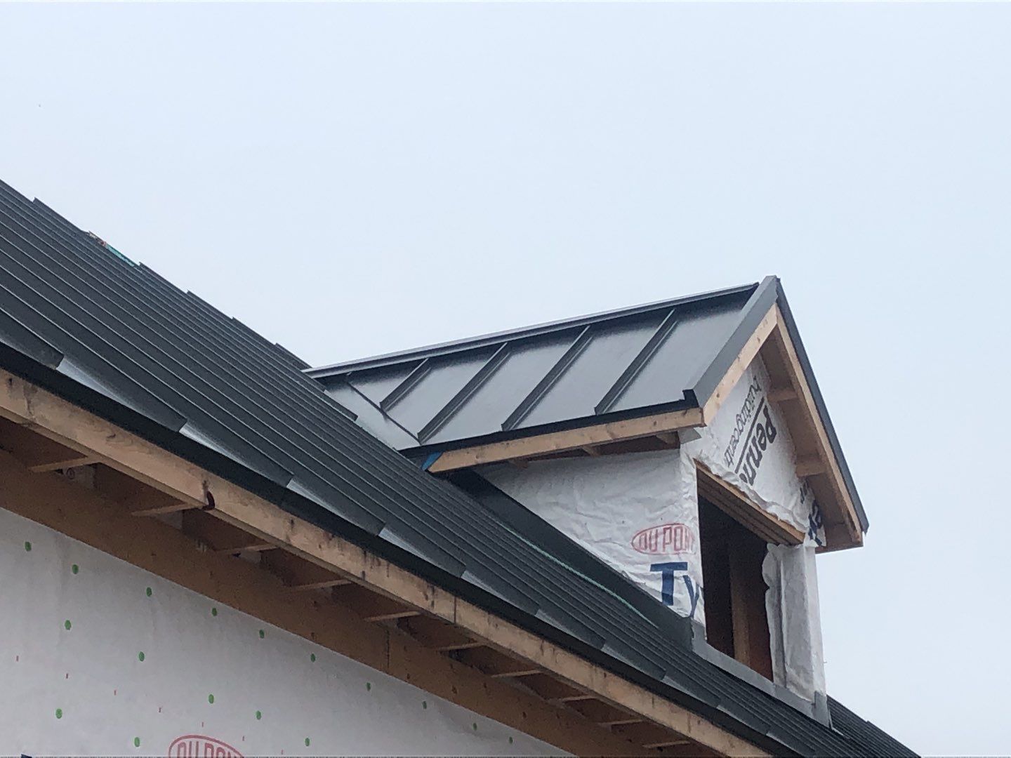 New Home Construction using 16" Standing Seam Panels by Jay Carter Roofing & Sheet Metal