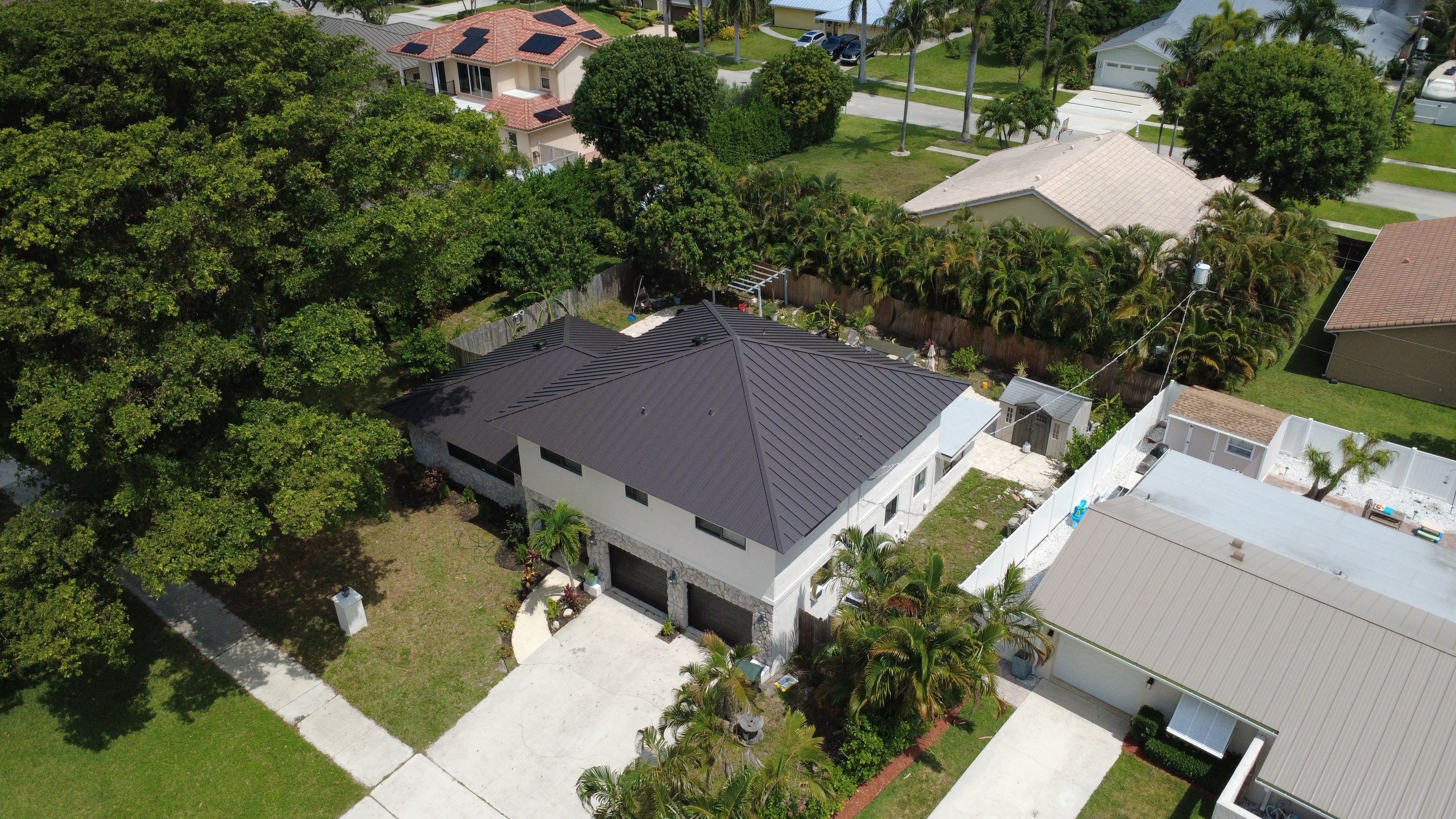 Residential Roofing Installation using 1.5'' Mechanical Seam by BLUES BROTHERS ROOFING
