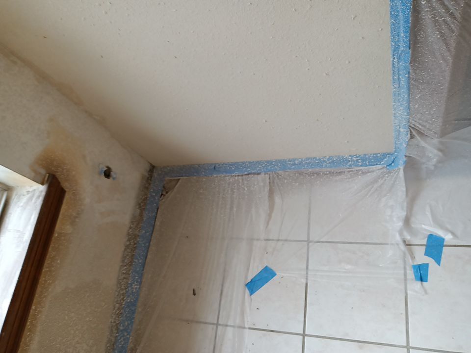 Interior and exterior painting project by Roof Concepts Construction