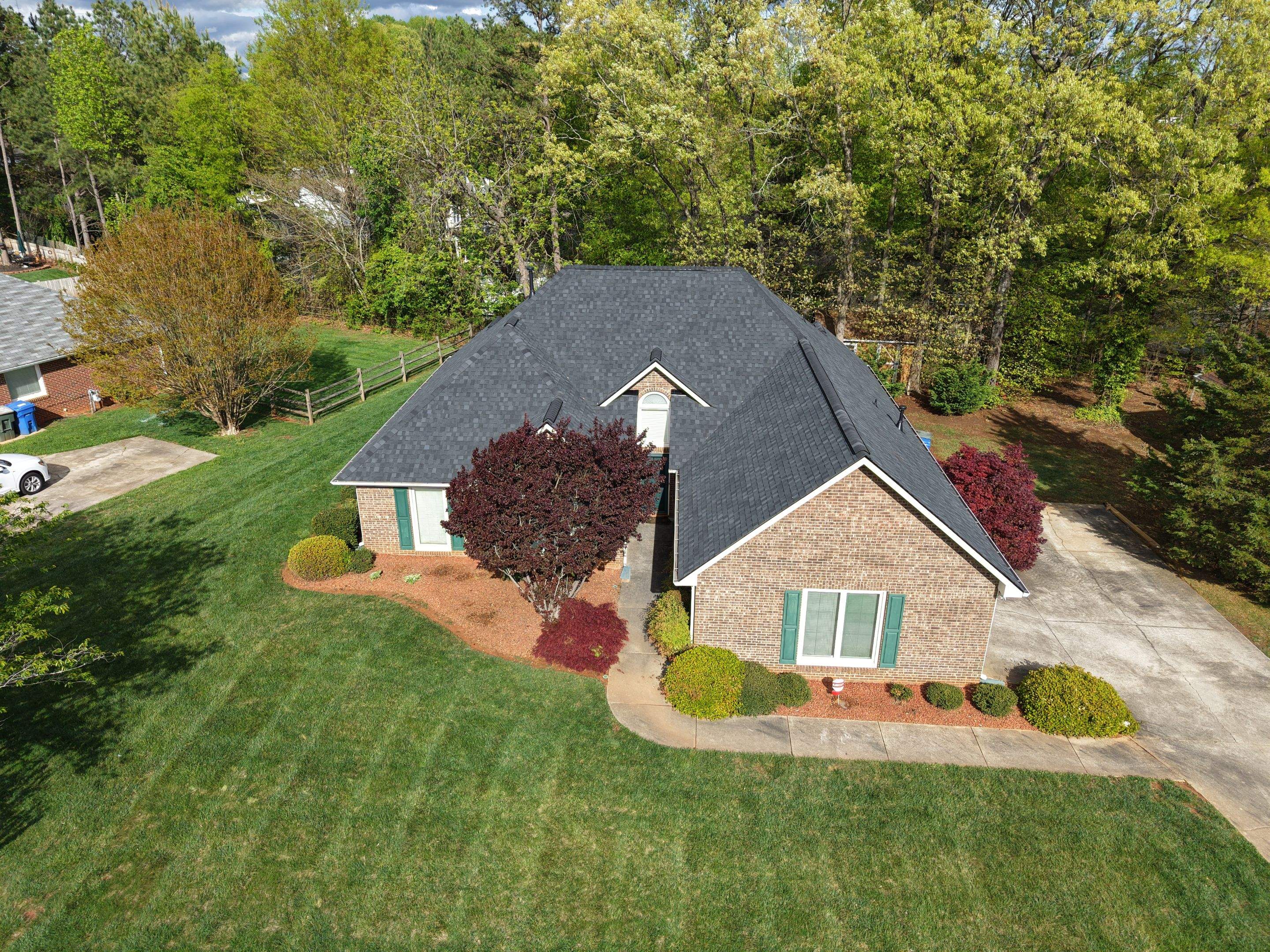 Residential Roofing Installation using TAMKO TITAN XT Rustic Black by RISE Roofing & Restoration, LLC