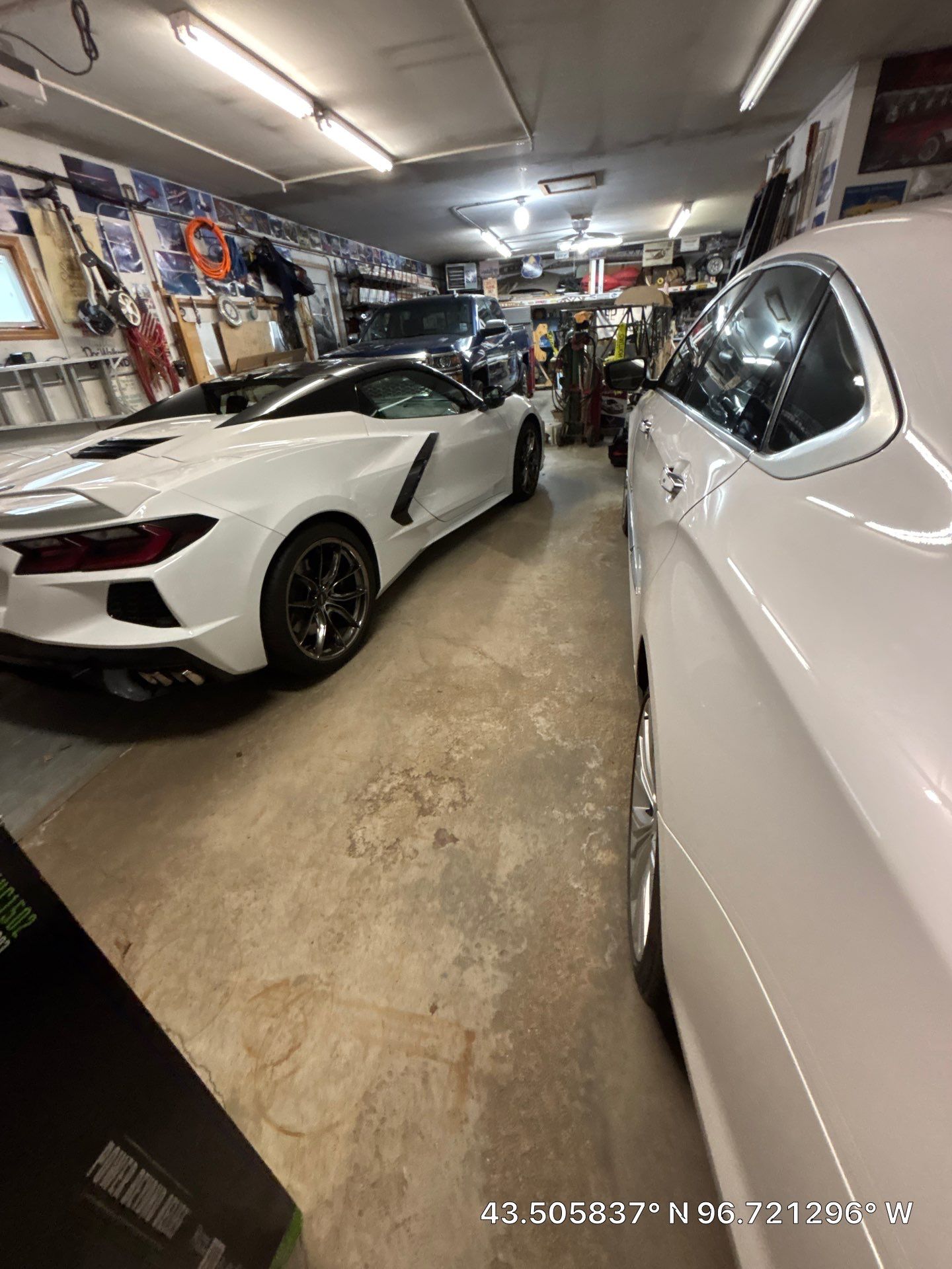High-Performance Polyurea Garage Floor Coating and Stem Wall Finishing in Sioux Falls by Select Painting, Coatings & Garage Cabinets