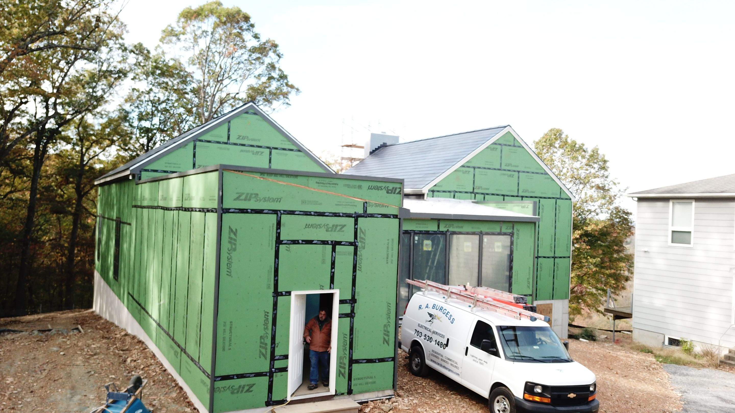 Roof Installation using Tesla Solar Roof V3 by American Home Contractors