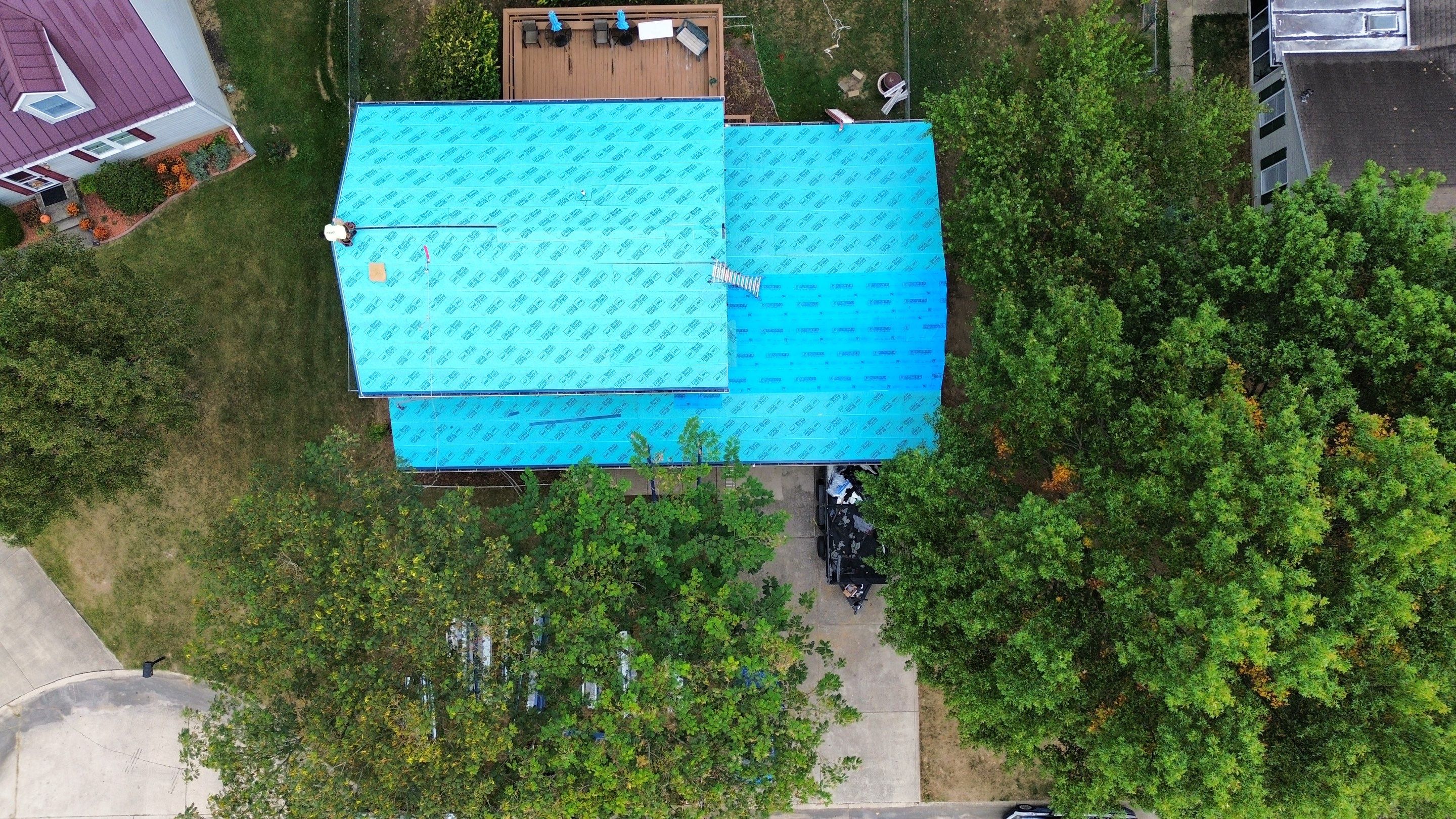 Residential Roofing Installation using Standing Seam Metal - Gallary Blue by RoofX 