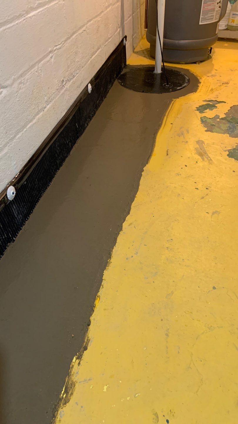 From a Conversation to a Dry Basement for Scott & Jean by Waterproofing Northeast