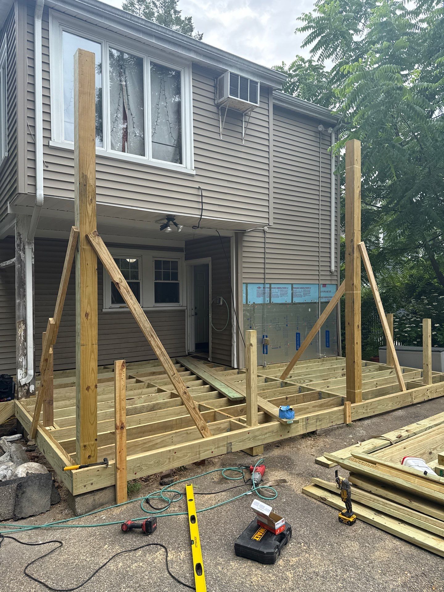 new deck with custom pergola by CabralCarpentry & Painting LLC