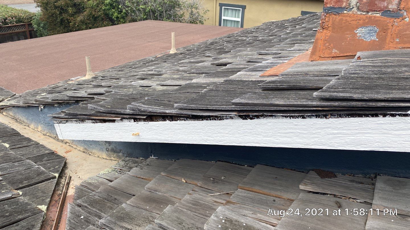 Refurbish and repair shake roof to get ready to sell by Straight Edge Roofing Inc