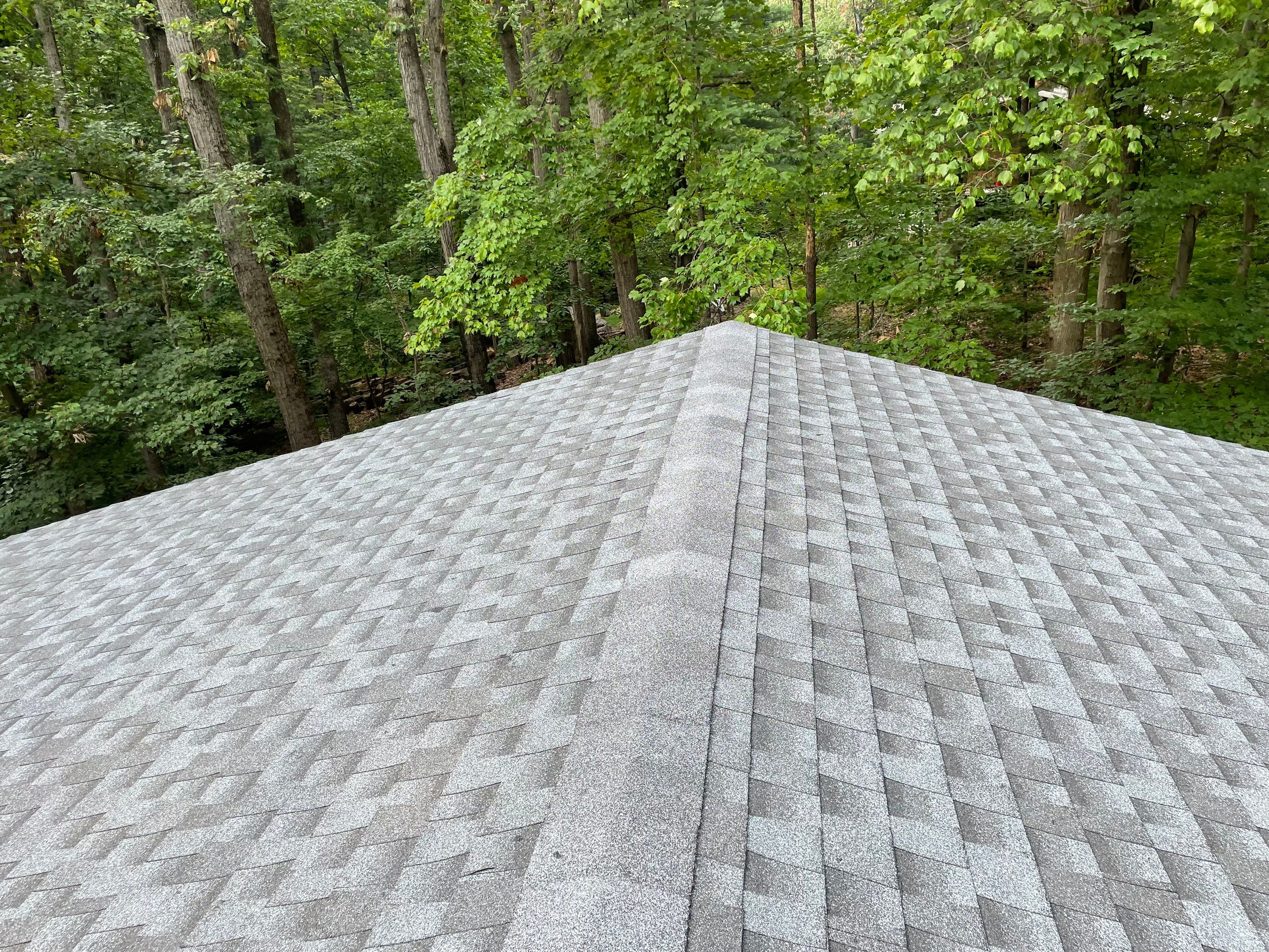 Deckhouse Roof Replacement by American Home Contractors