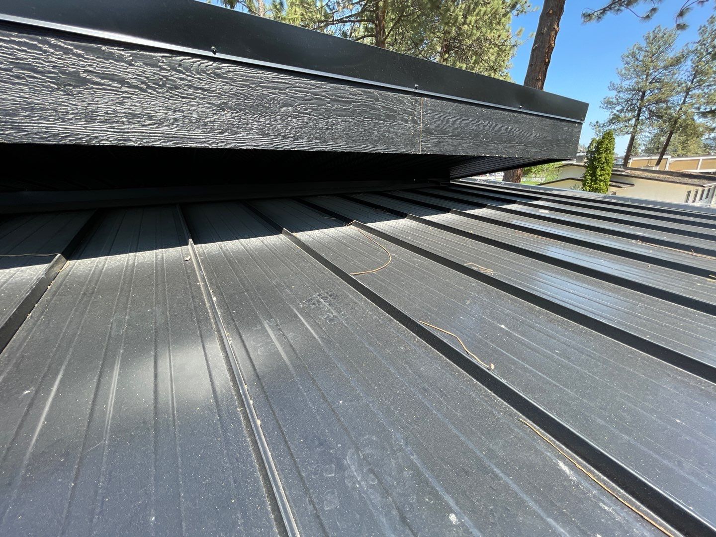 Residential Roofing Installation using 12" Prolok metal  by Top Notch Roofing Inc