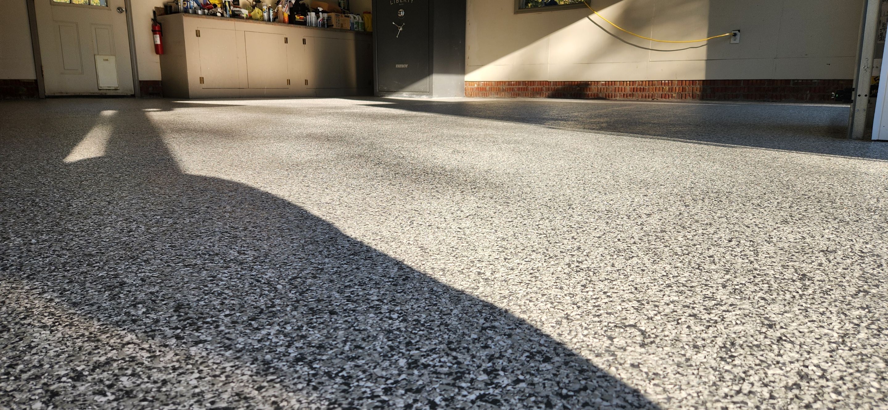 Garage using Gravel by Elite Floor Solutions