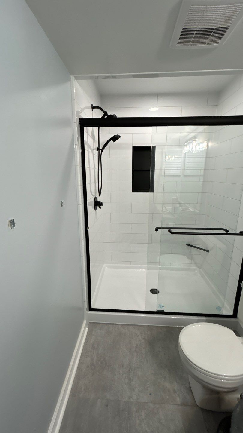 From Stall to Walk-In Shower by BathPlanet SW Virginia