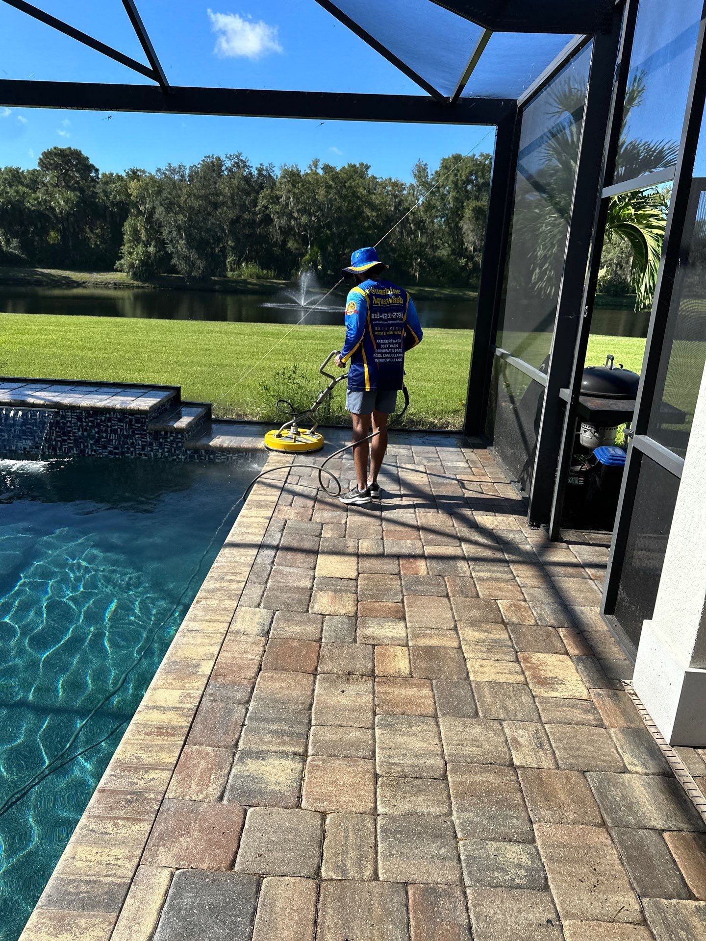 Paver Driveway, Sidewalk, and Pool Deck Cleaning in Winding River Community, Bradenton, FL by Sunshine AquaWash