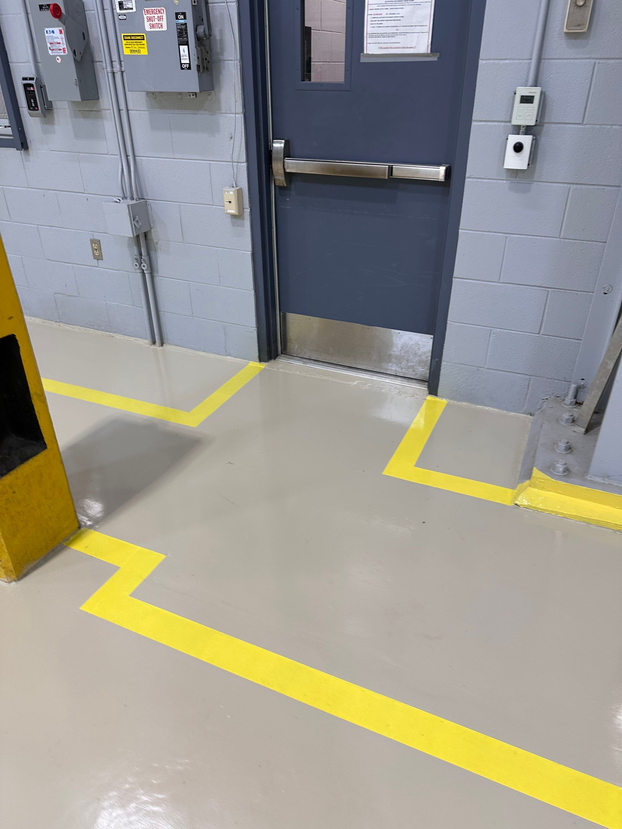 Industrial Epoxy Flooring for Army National Guard Hangar in Mobile by Cornerstone Hard Surface Restoration 