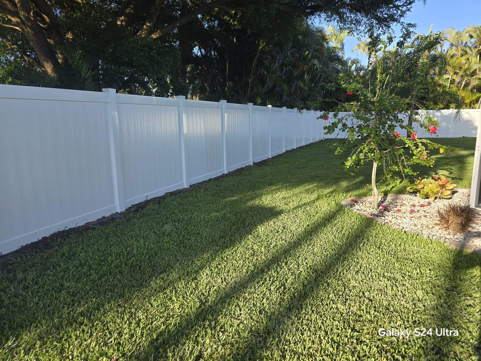 White Vinyl Privacy Fence and Double Gate Installation in Fort Myers by True Fence LLC
