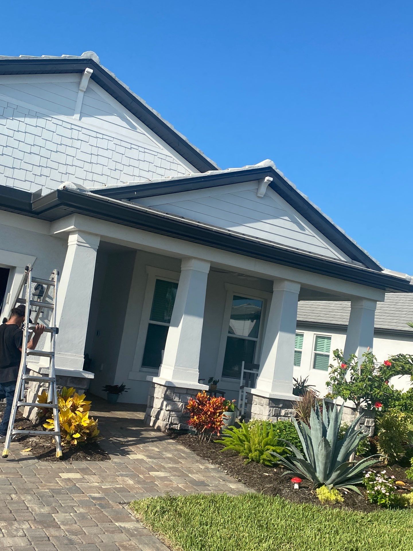 Black 7-Inch Gutters with Matching Downspouts in Lakewood Ranch FL by Gutter Professor by Gutter Professors