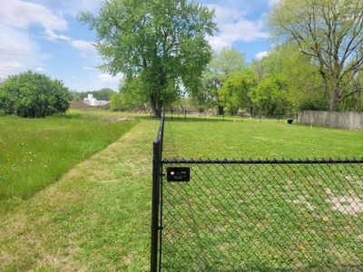 Black Chain Link Fence Installation and Gate in Traer