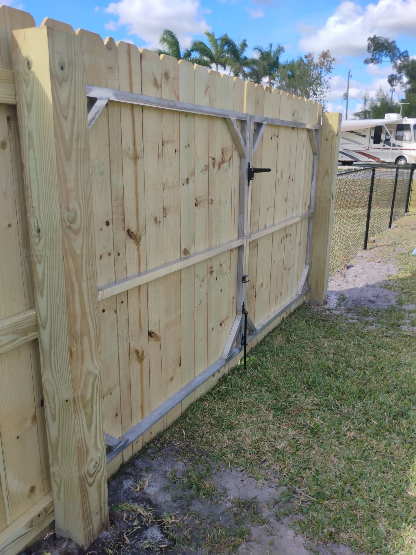 Wood and Chain Link Fence in Port Charlotte by True Fence LLC