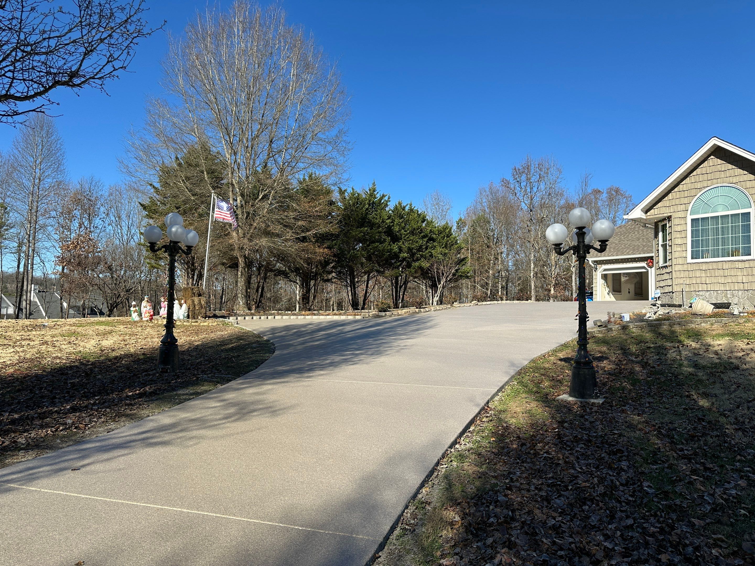 Driveway using Obsidian by Elite Floor Solutions