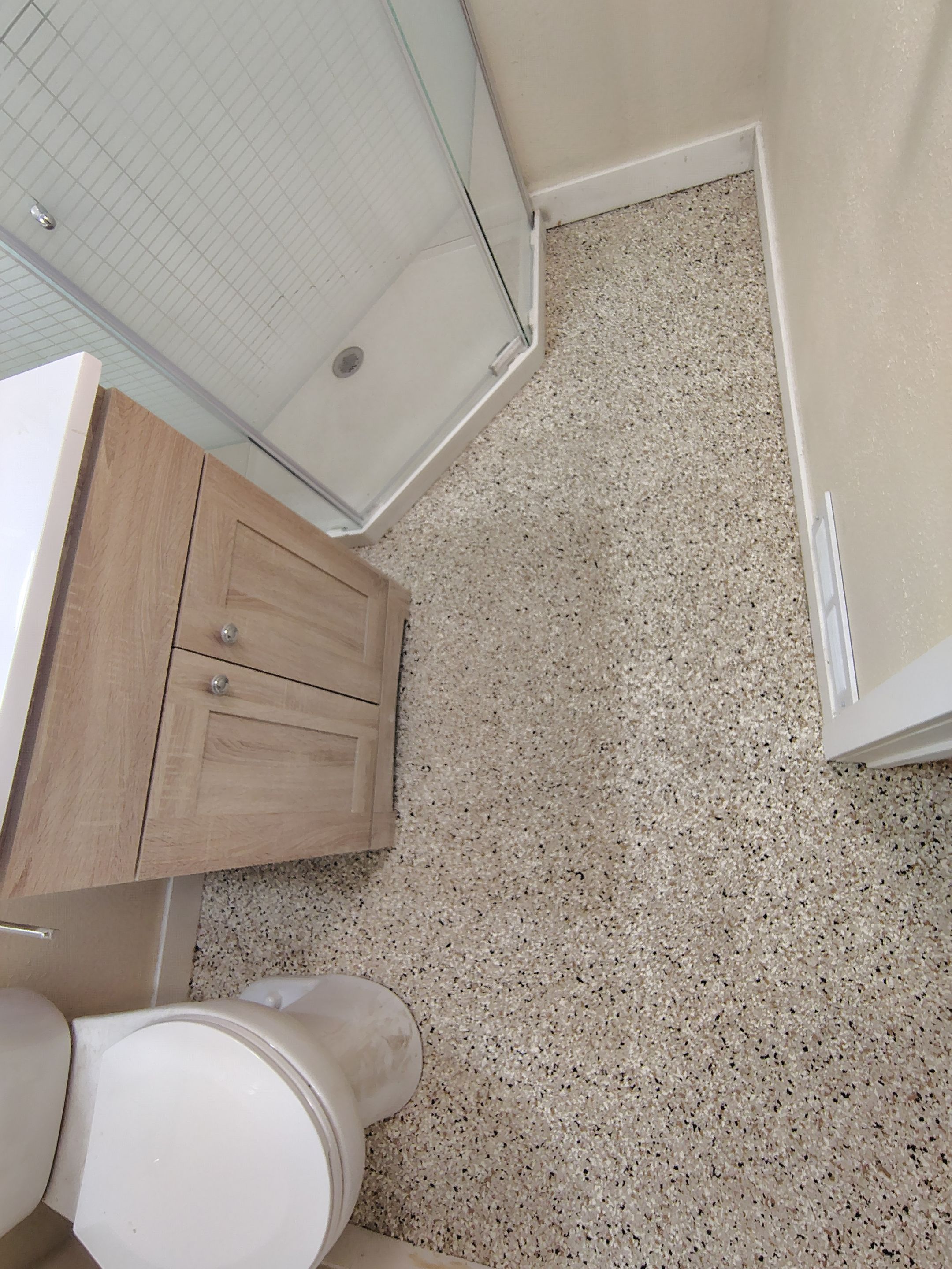 Comprehensive Basement Concrete Floor Coating and Crack Repair in Sioux Falls by Select Painting, Coatings & Garage Cabinets
