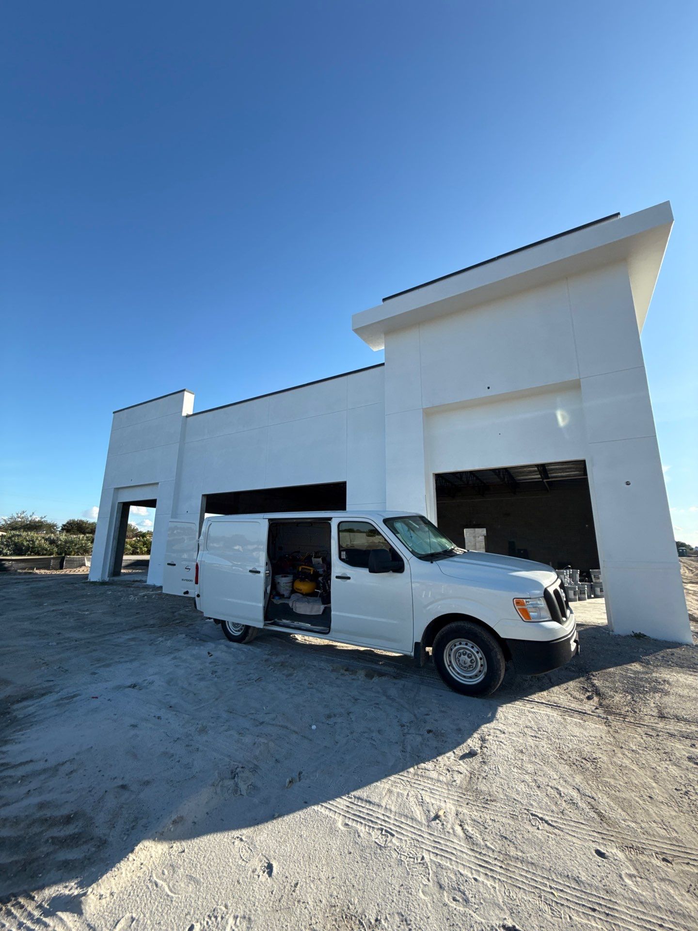 Downspout Installation using collector head in Cape Coral FL by Gutter Professors