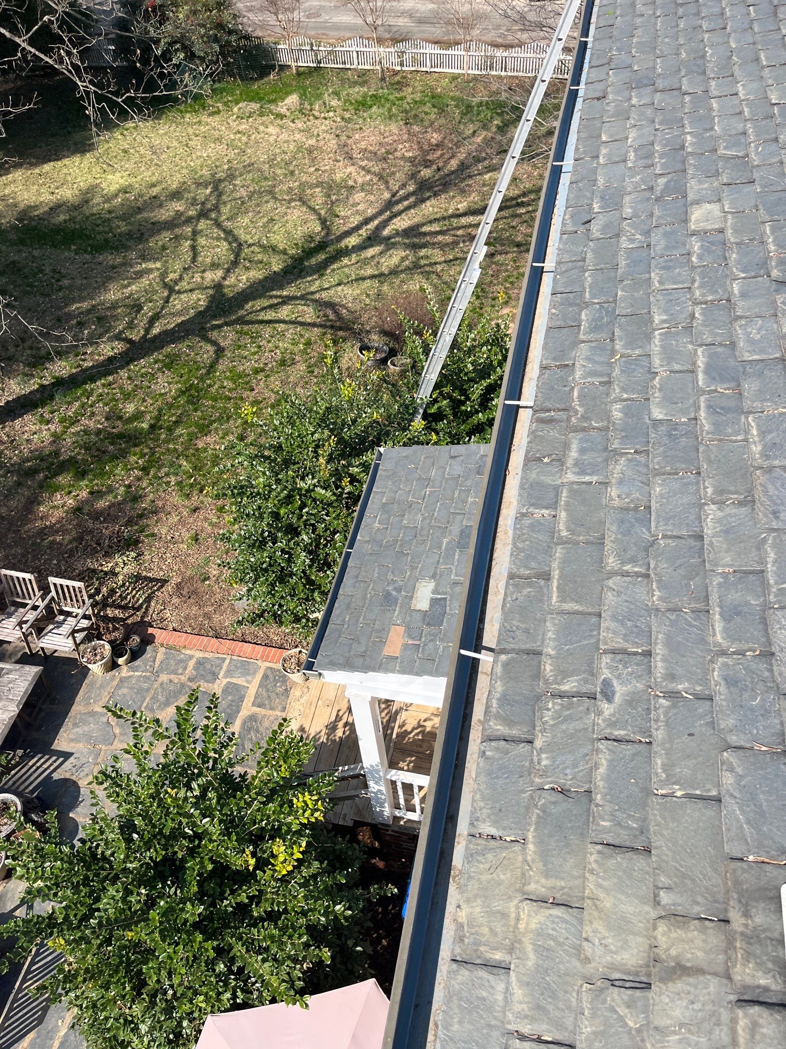 Slate Roof Restoration and Copper Ridge Cap Install in Richmond by Cade Construction