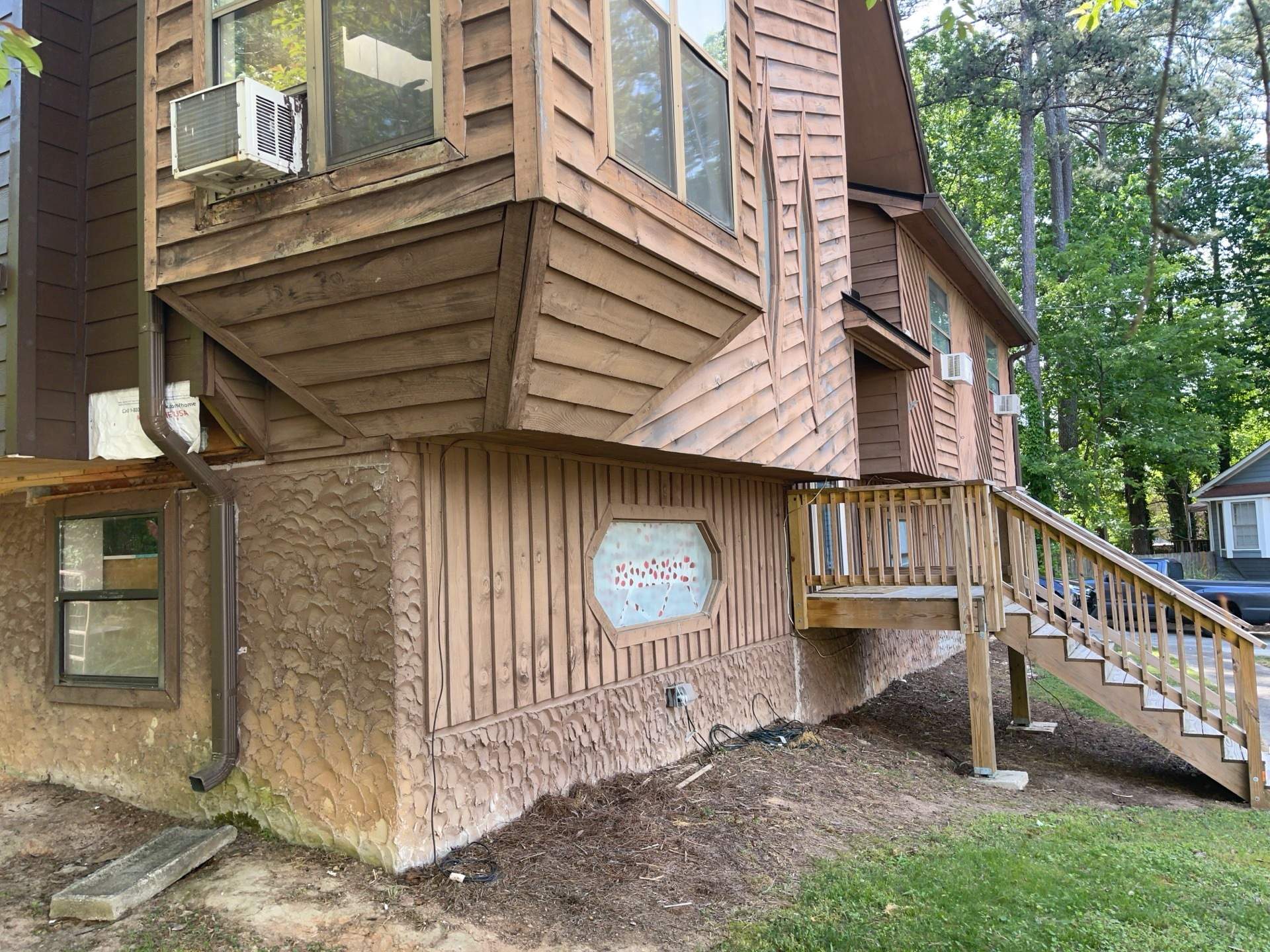 Snellville,GA Siding Replacement and Multi-Colored Exterior Painting by Nelson Exteriors