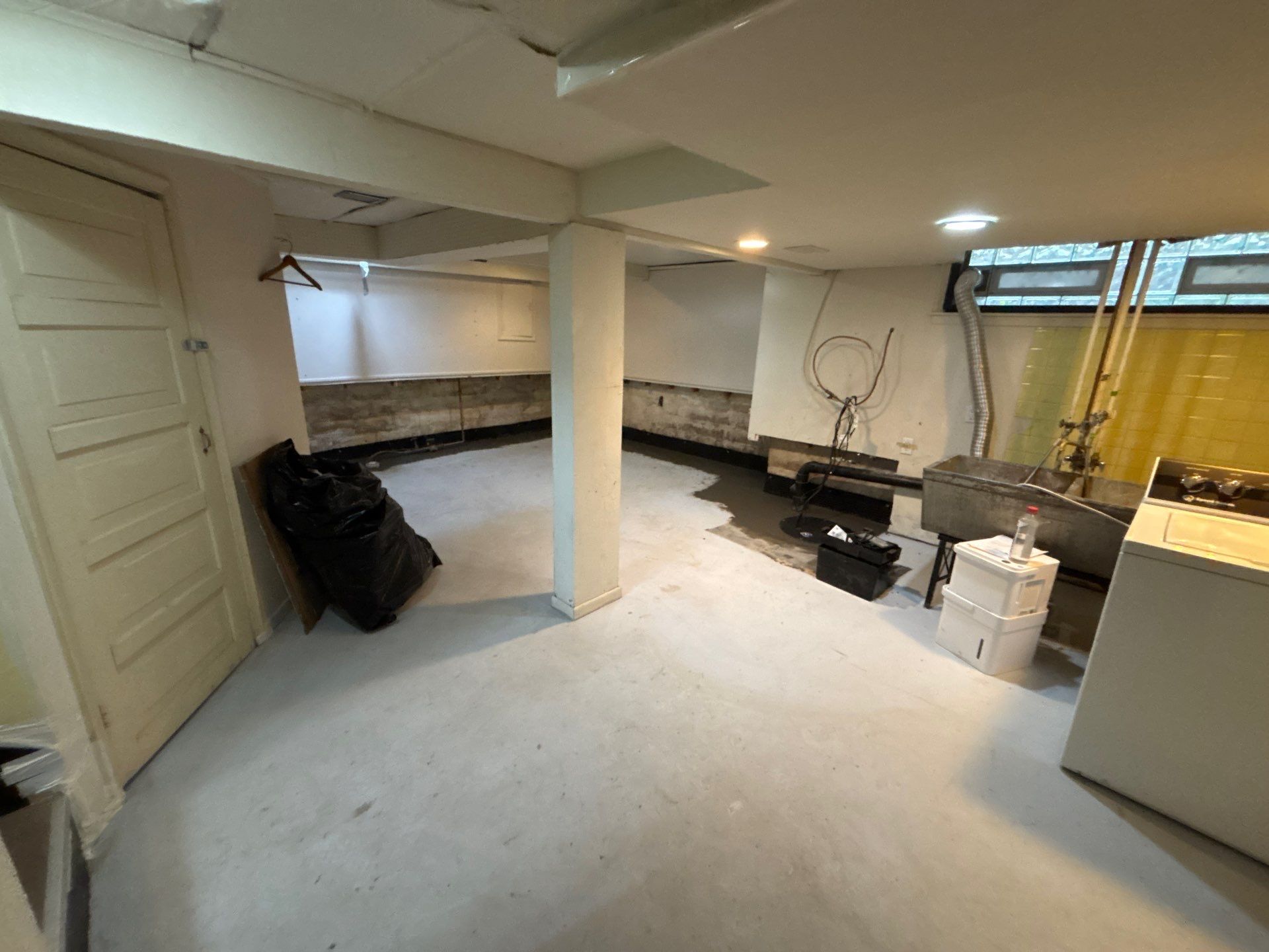Interior Drain Tile & Sump Pump Installation in St. Paul, MN by Waterproofing Northeast