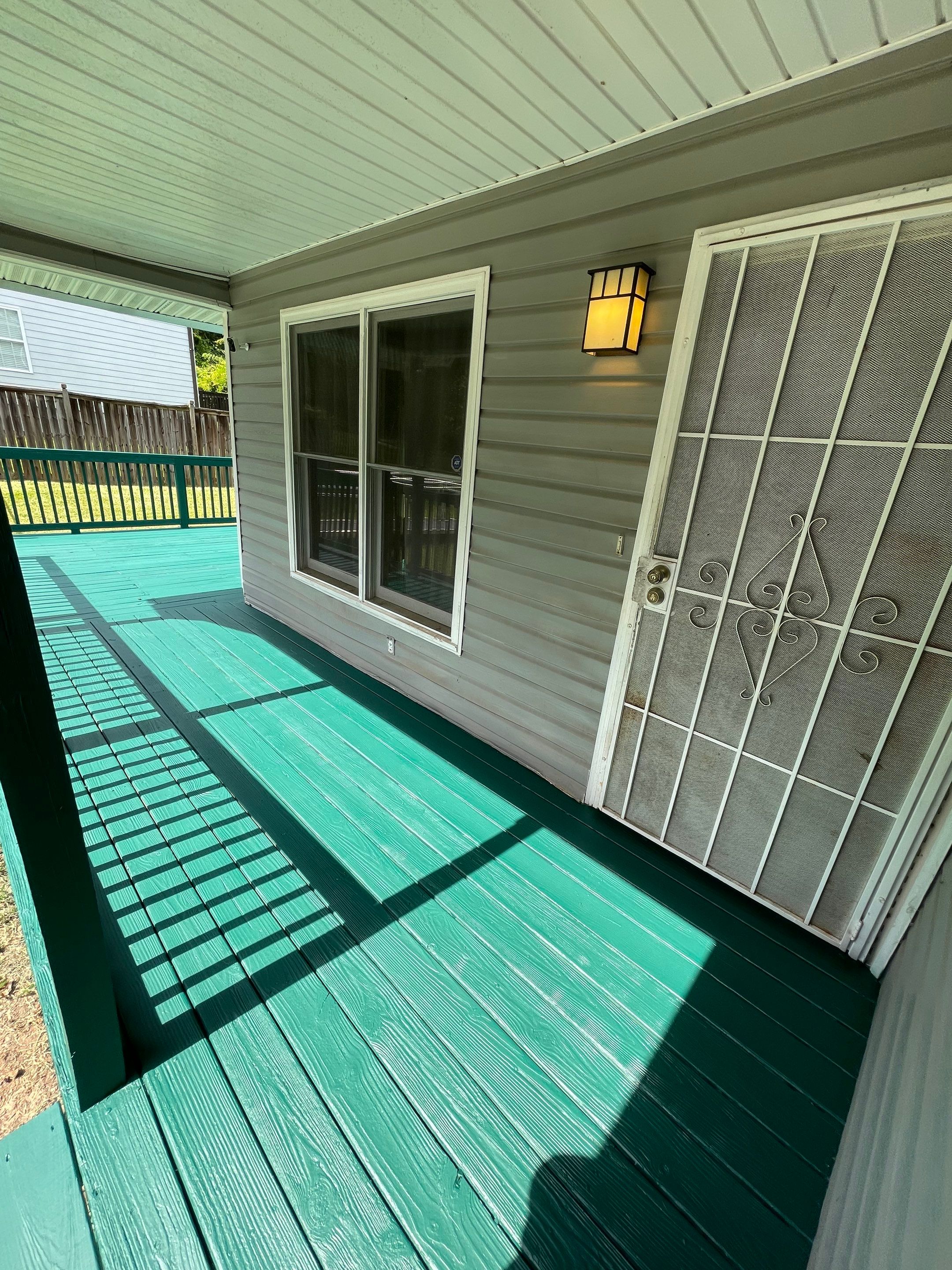 Deck Refinishing and Exterior Painting with Custom Green Finish in Decatur by Swift Home Renovations