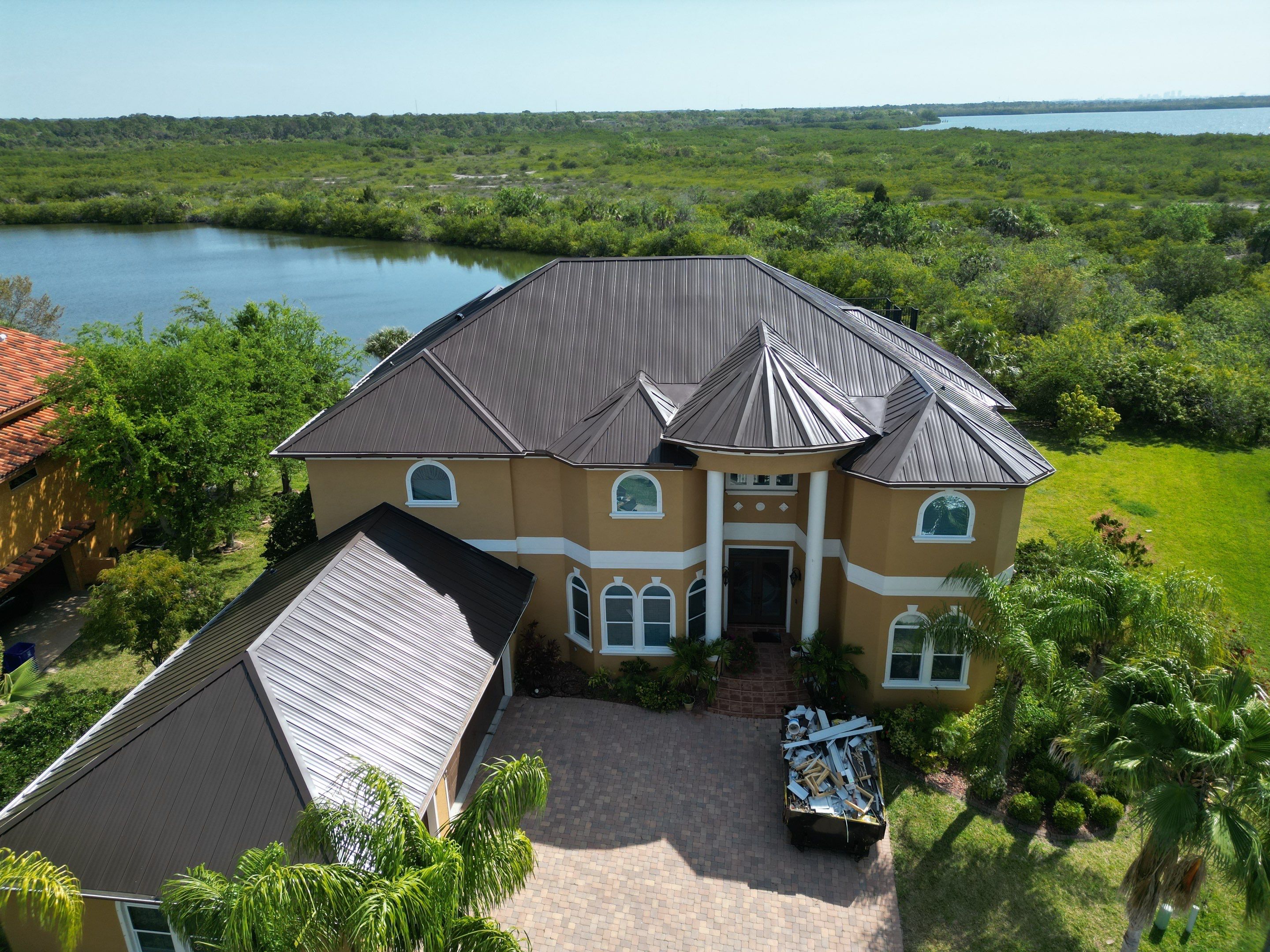 Dark Bronze Standing Seam by Reimagine Roofing