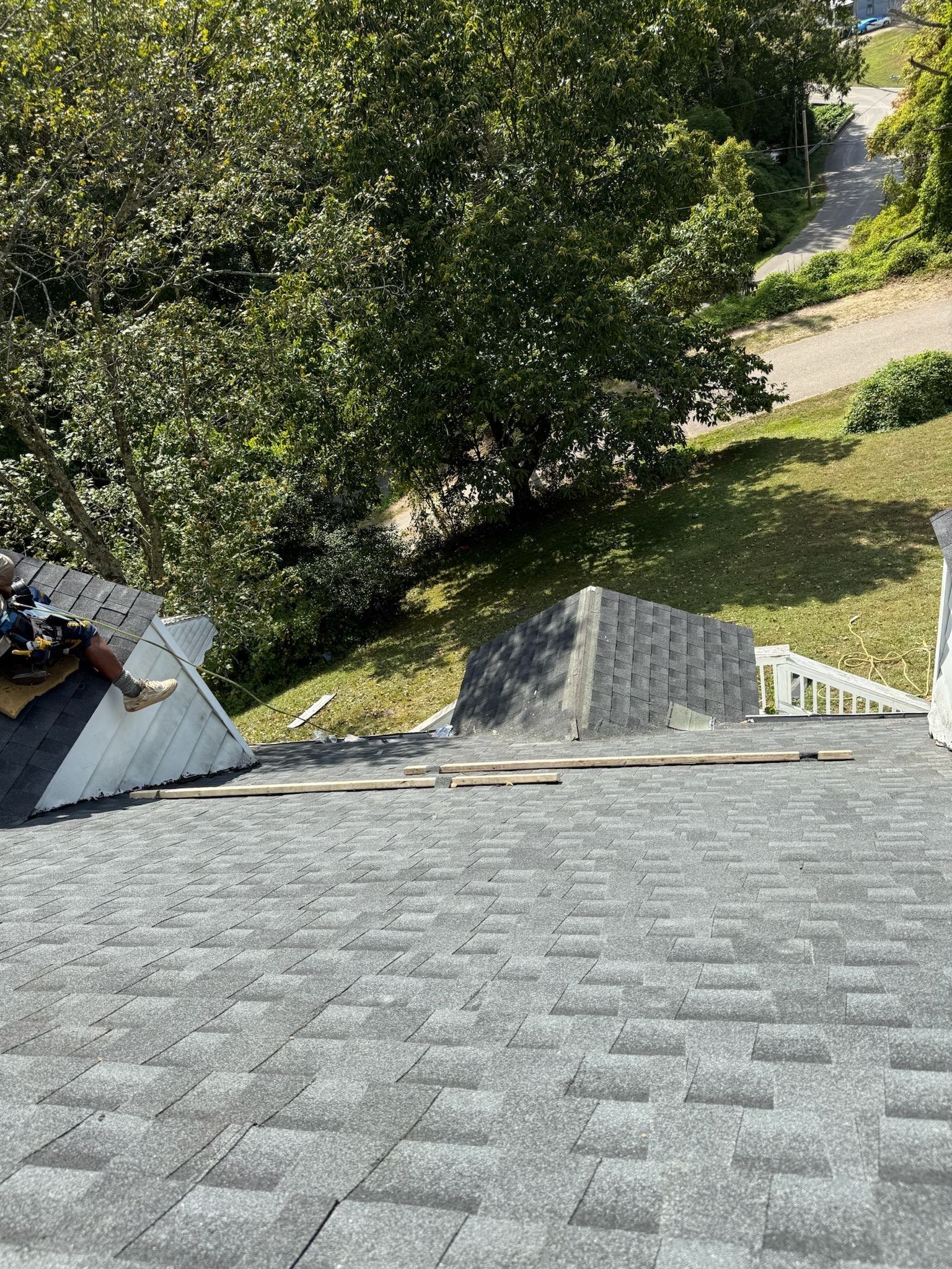 Residential Roofing Installation using GAF Timberline HDZ Charcoal by Rainstoppers Roofing