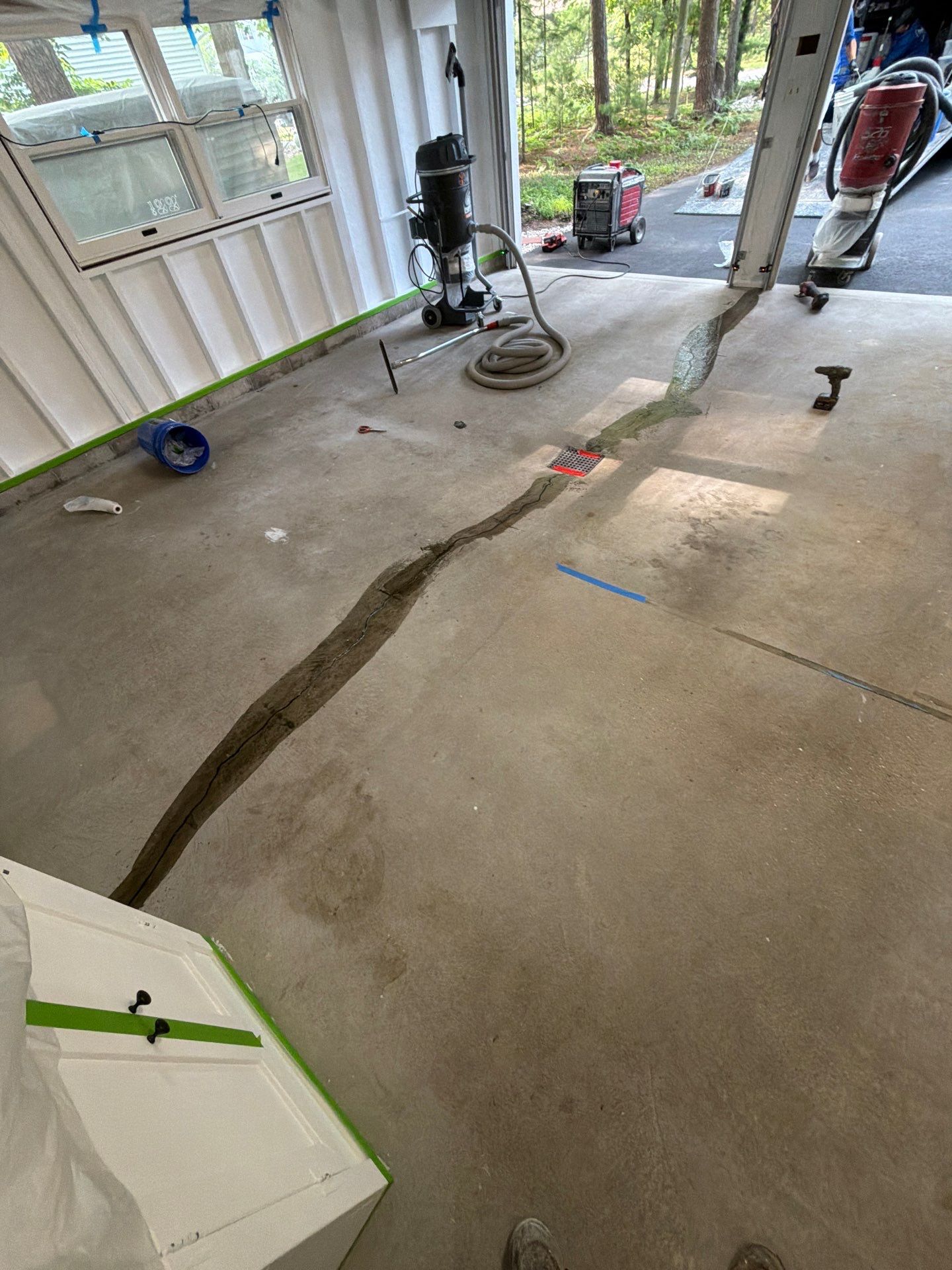Pentwater Garage Epoxy Flake Floor Installation and Exterior Refinement by Gordon Painting