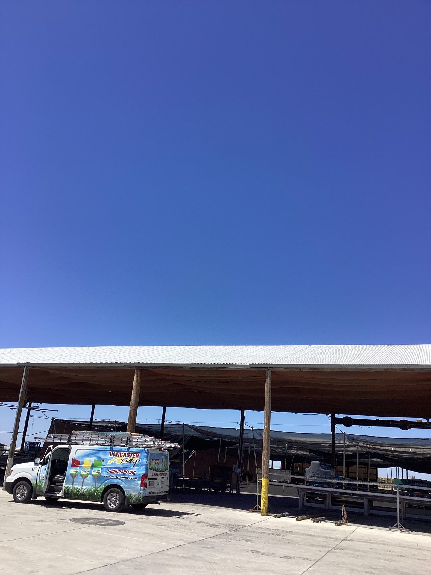 Exterior Painting on Metal Roof by Lancaster Painting