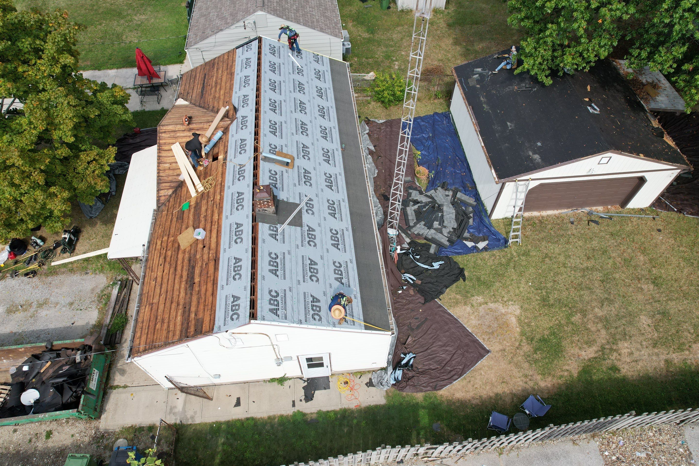 East Lake Roof & Garage  Replacement (With Gutters) by Atlas Roofing & Restoration