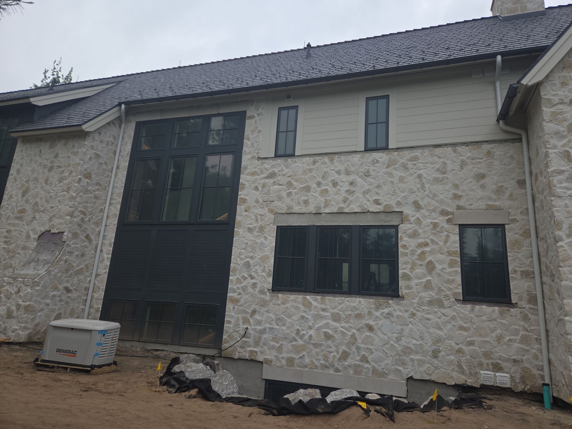 Half Round Gutter Installation for Petoskey Residence by Rainbow Seamless Systems
