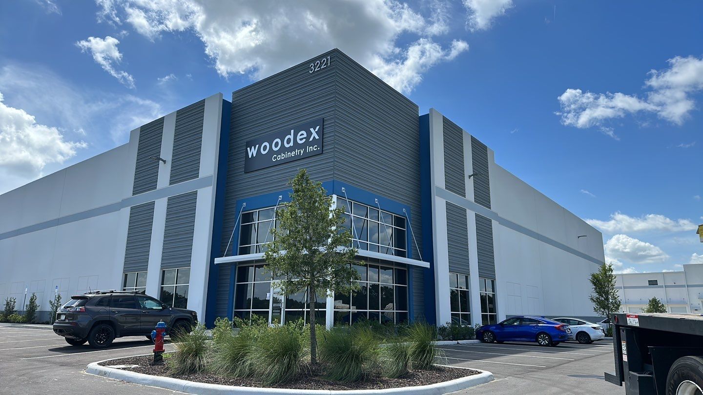 Acrylic Letters on Aluminum Backer for Woodex Cabinetry by SignCrafters