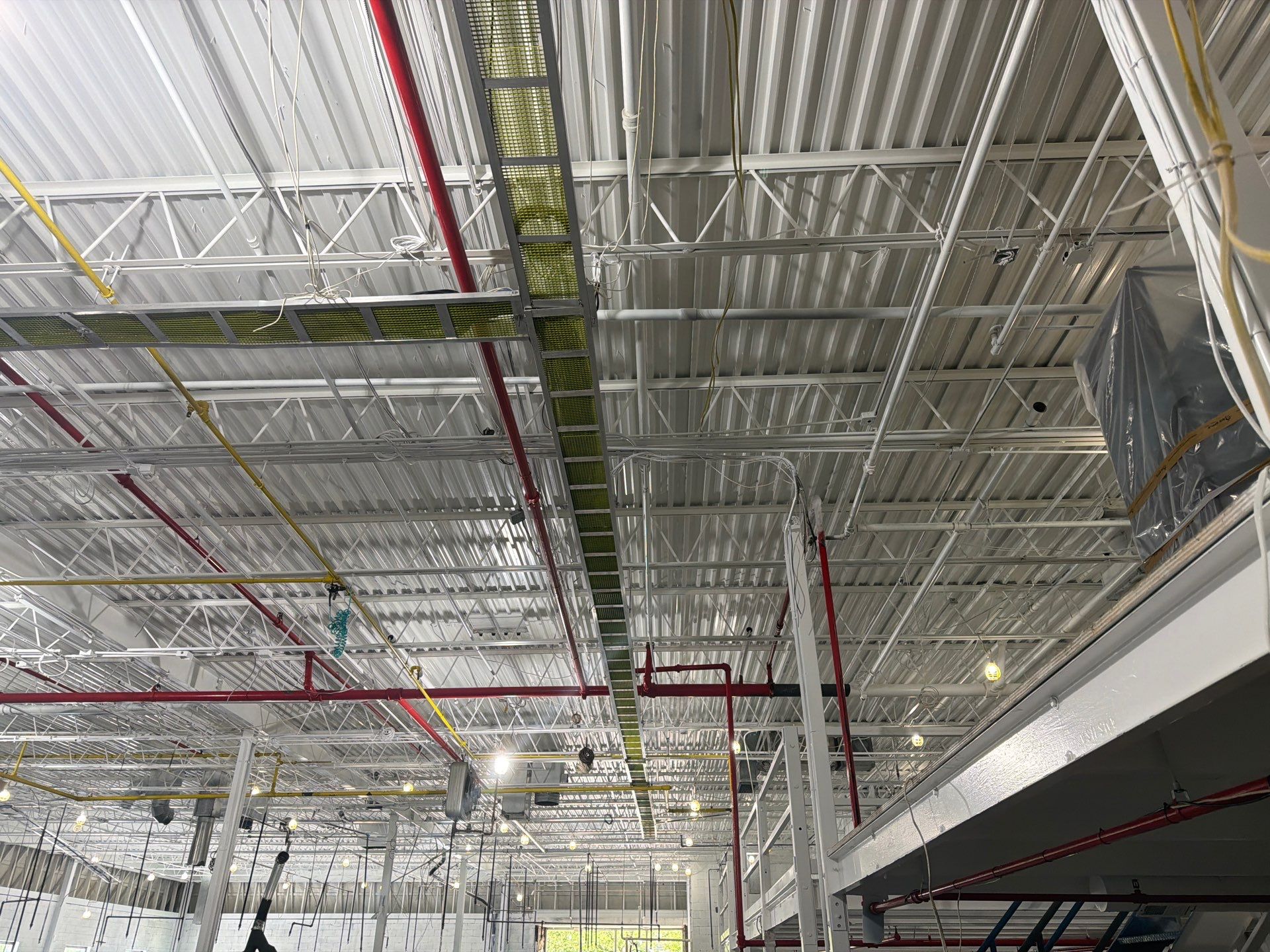 Industrial Warehouse Fire Damage Cleaning and Spray Sealing in Islandia by EMS Restoration Corp