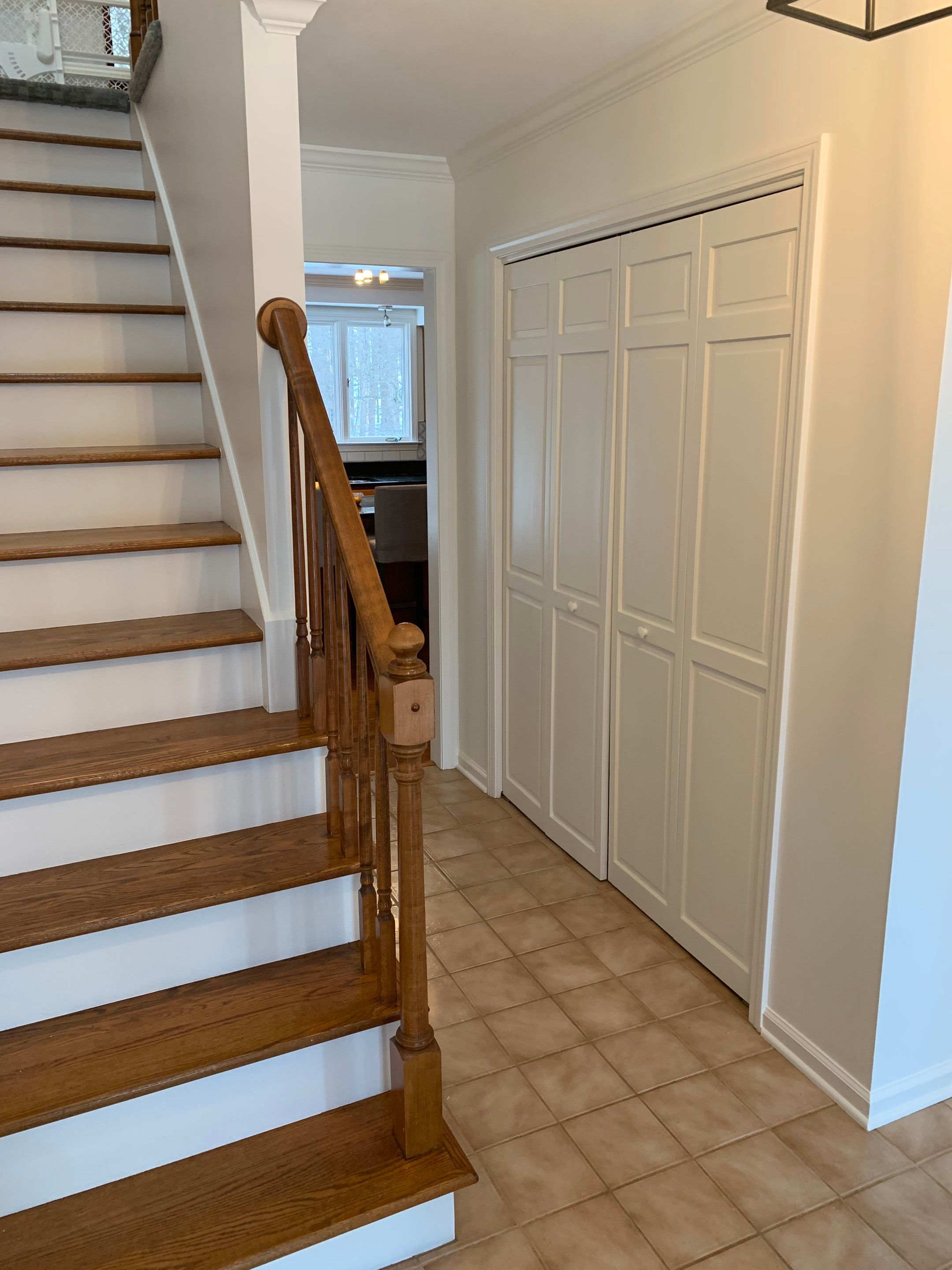 Painting Stained Wood Trim and Staircase. Walls too! by Empire Painting Services, LLC