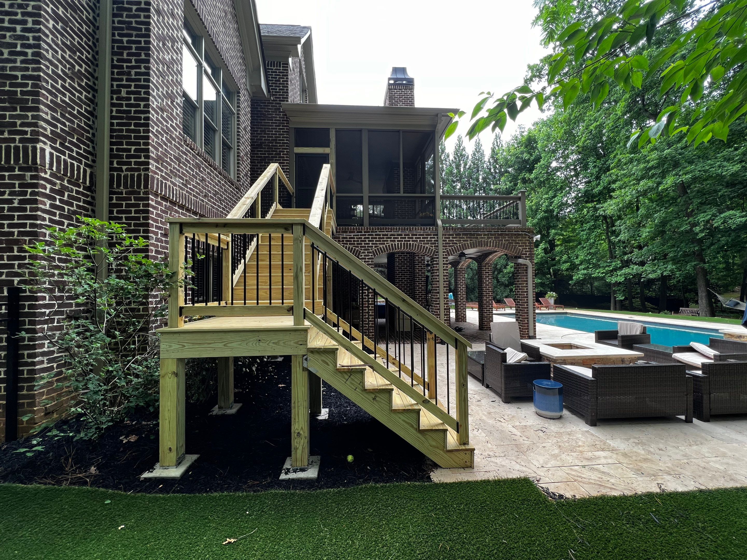 Custom Deck Stairway Addition with Metal Balusters in Atlanta by Swift Home Renovations 