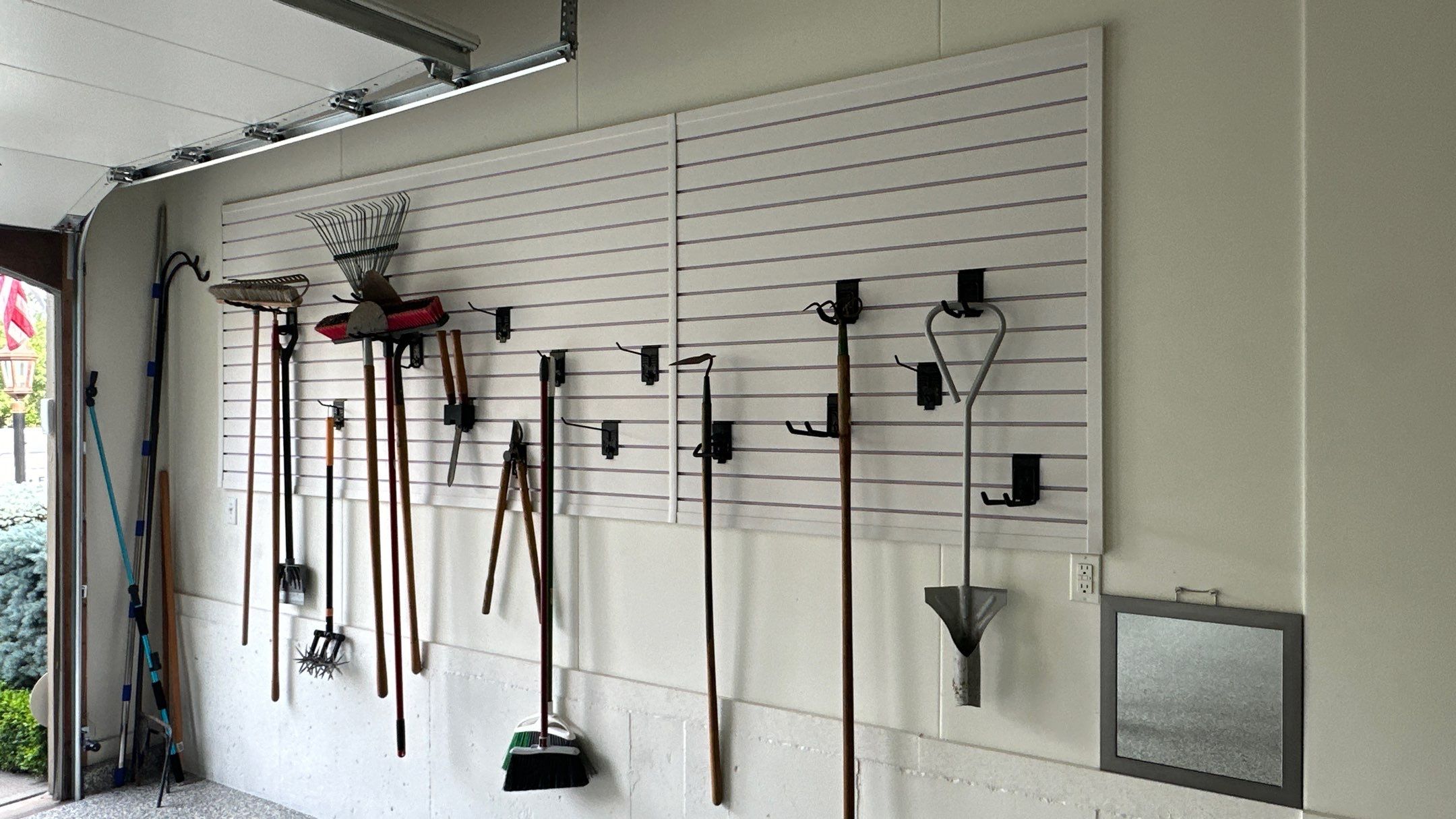 Steve L. went with brite white slotwall in his garage by Banner Garage