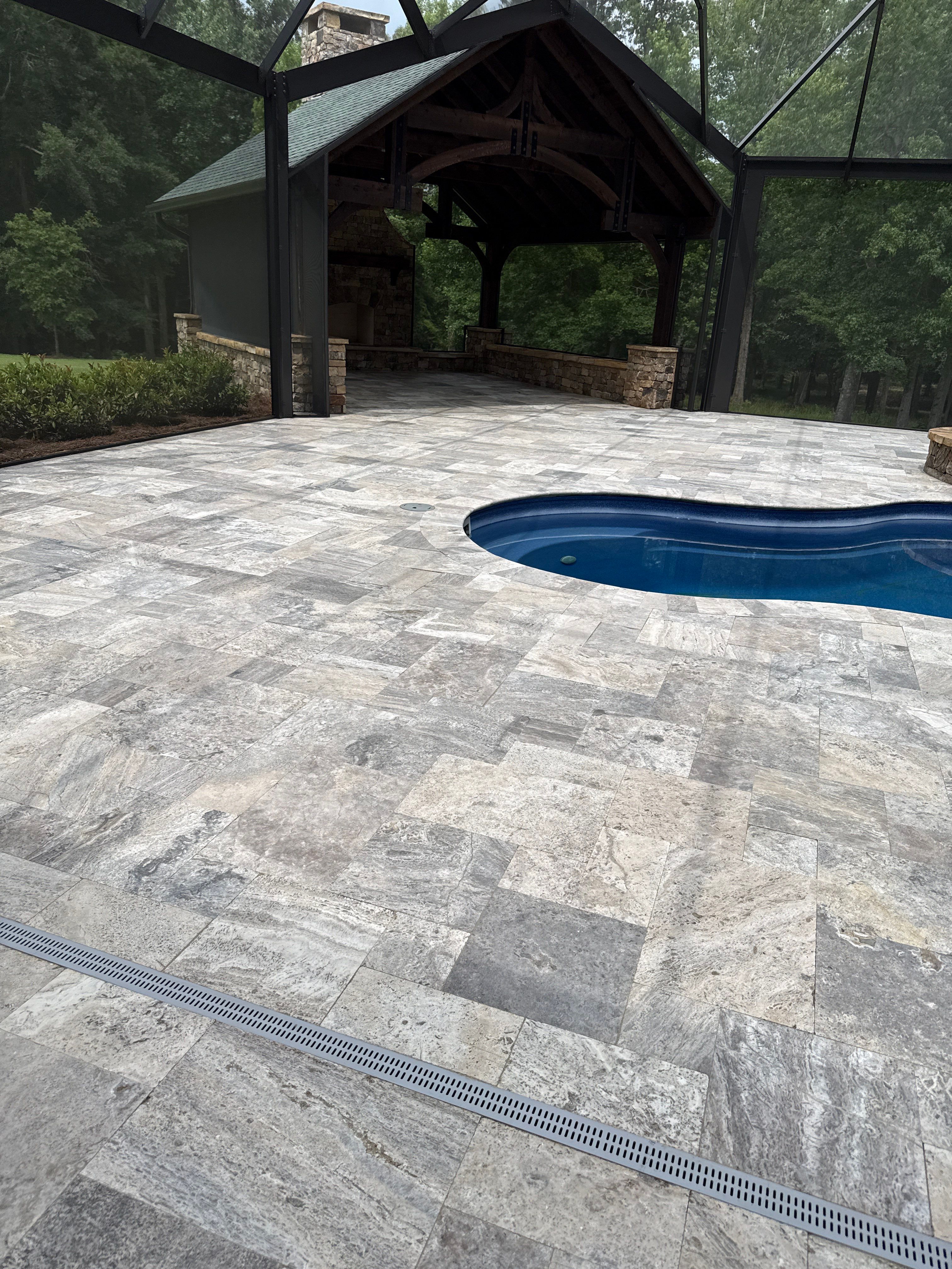 Travertine Patio and Natural Stone Spa in Brantley by Cornerstone Hard Surface Restoration 