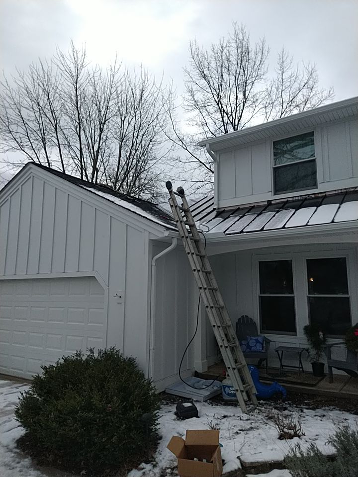 James Hardie Siding  using James Hardie Board and Batten, White by Absolute Roofing and Construction