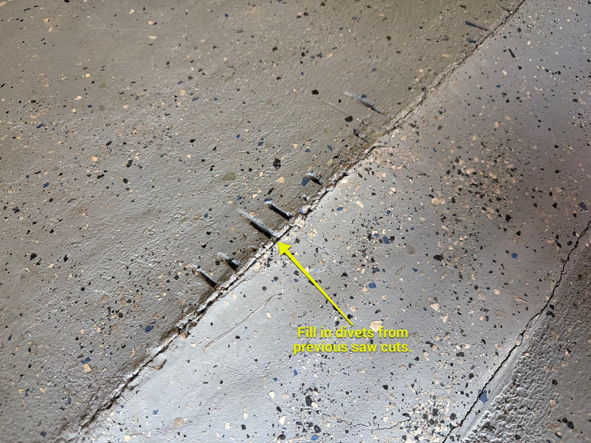 Custom Grey Flake Epoxy Garage Floor Installation in Remsen by Select Painting, Coatings & Garage Cabinets