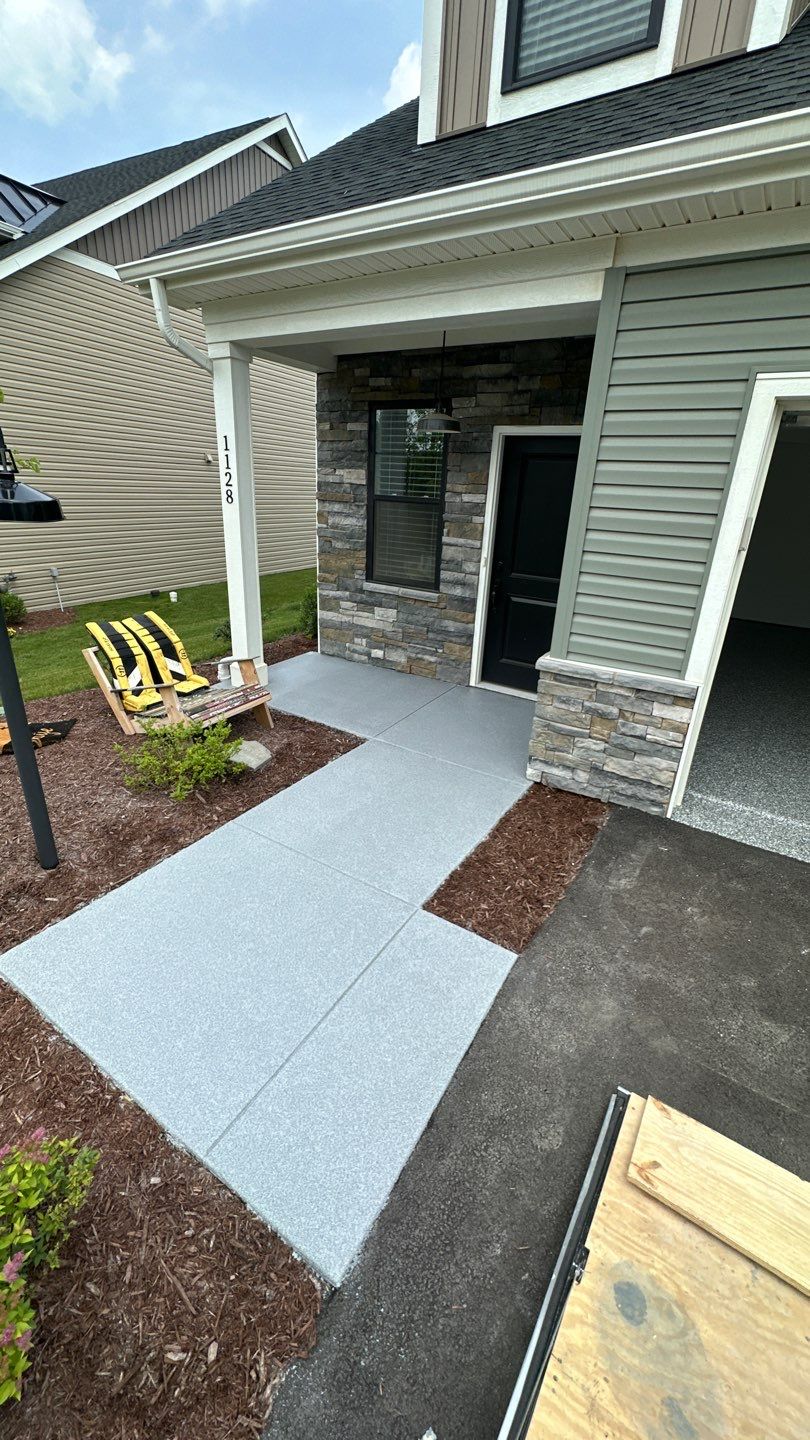 Porch + Garage Project in Evans City by Floors in a Day, Inc