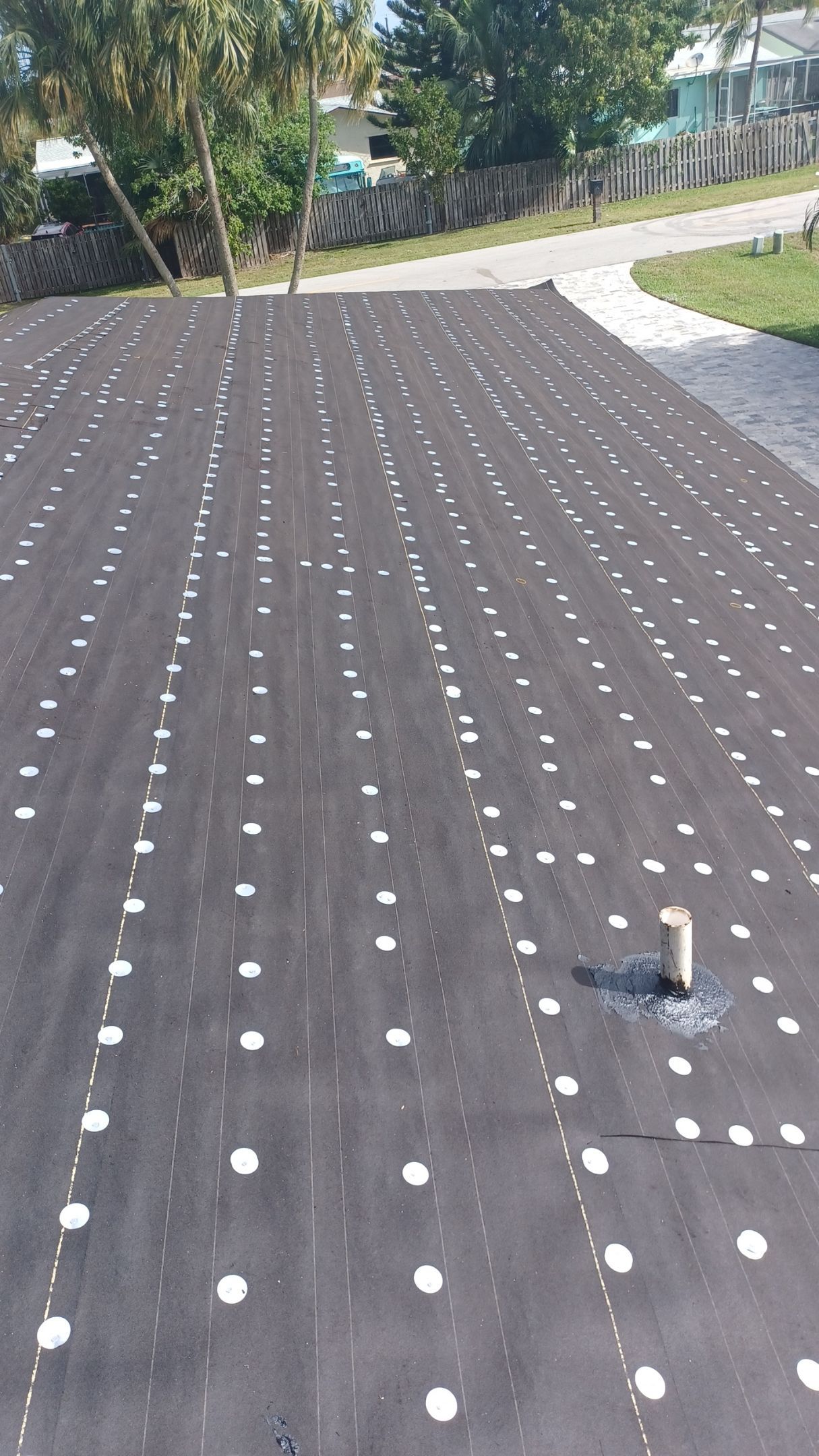 Residential Roofing Installation using 1" Nail strip metal roof by BLUES BROTHERS ROOFING